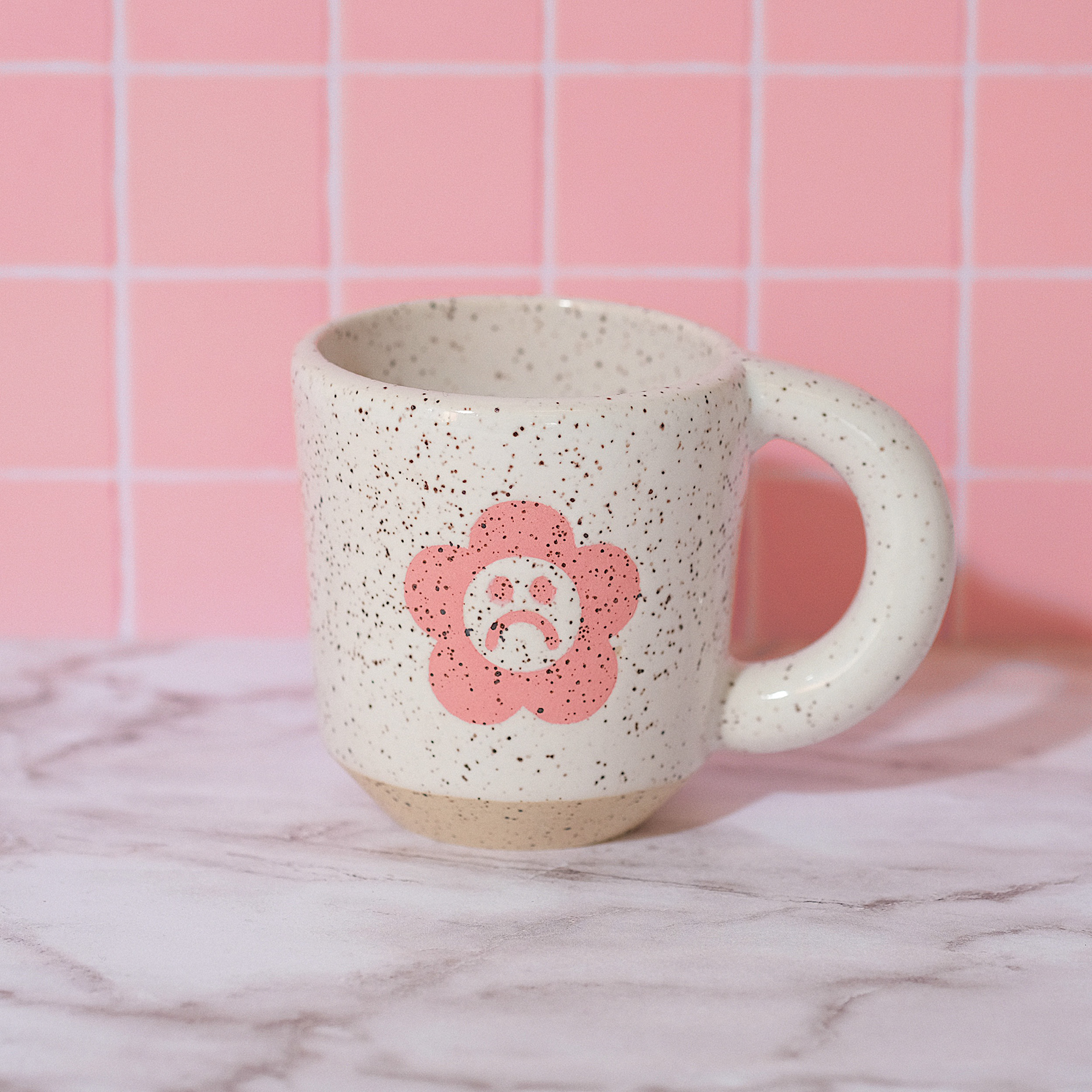 pink white speckled mug