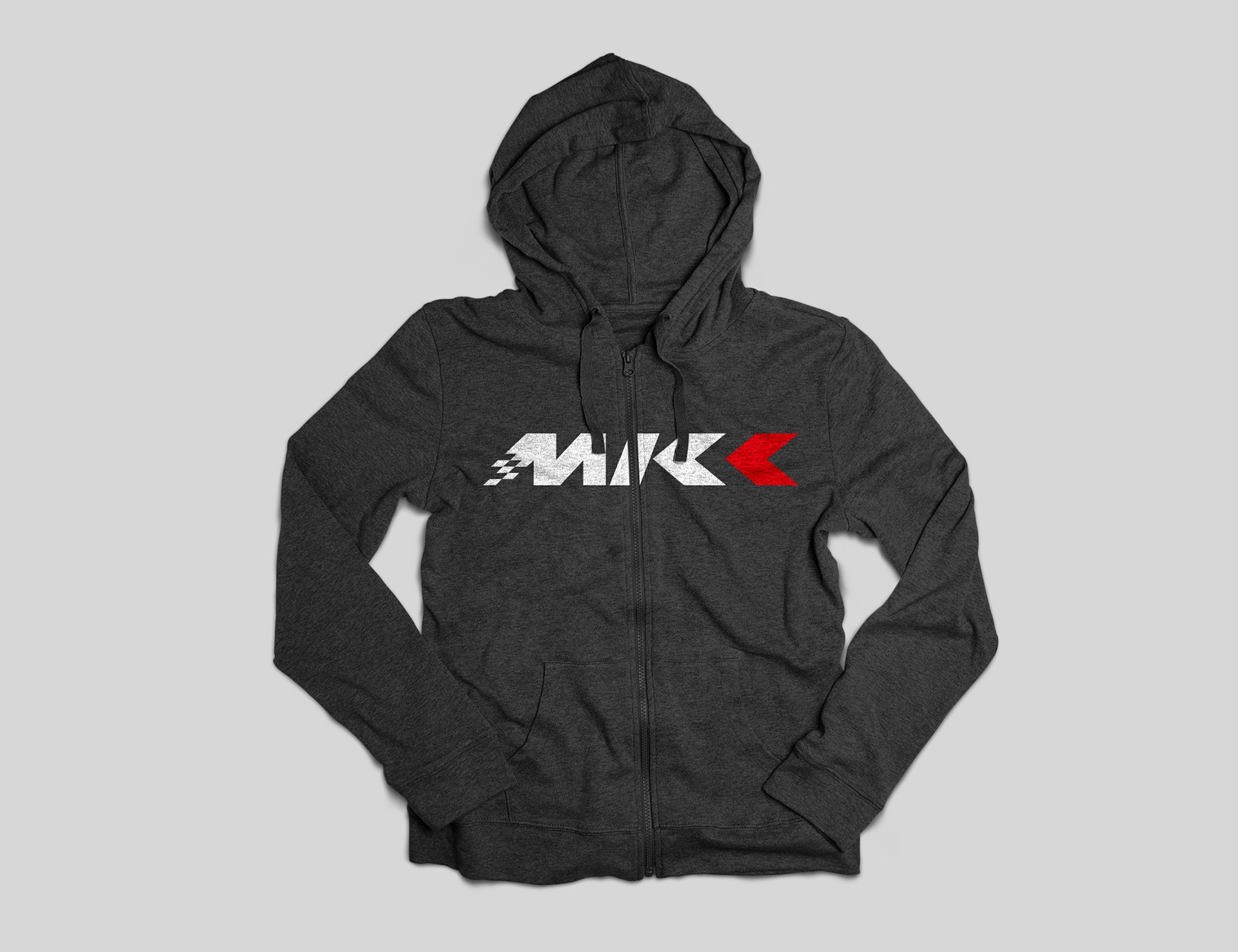 Aplicación logotipo MKI sobre sudadera diseñado por Global y punto