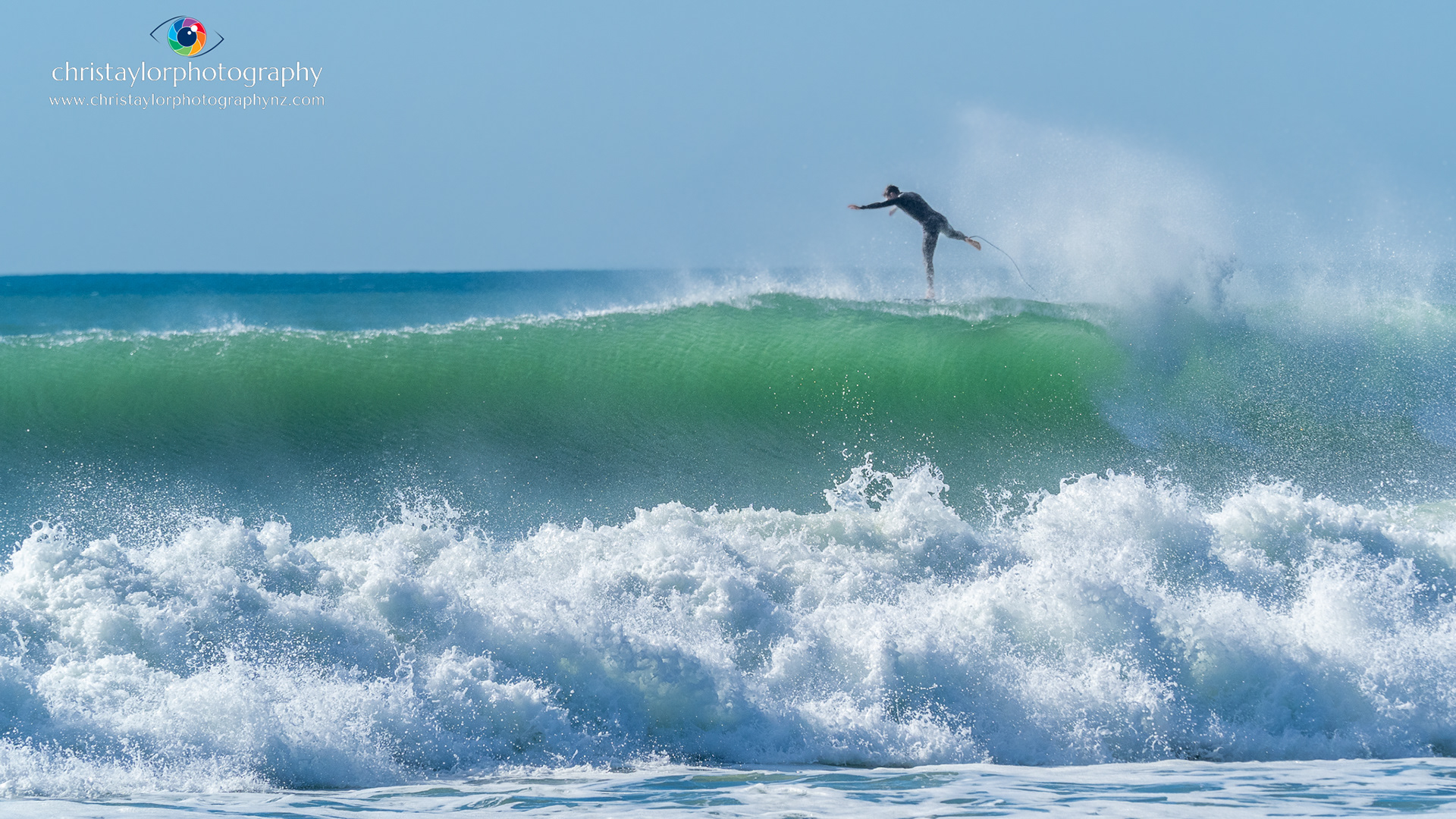 Riding high. Surfer, Papamoa Beach P5010047
