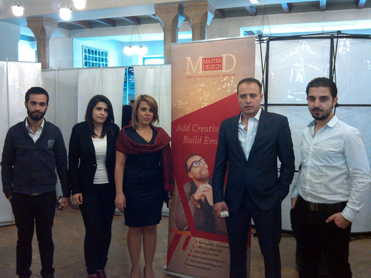 With the team by a job fair for fresh graduate 