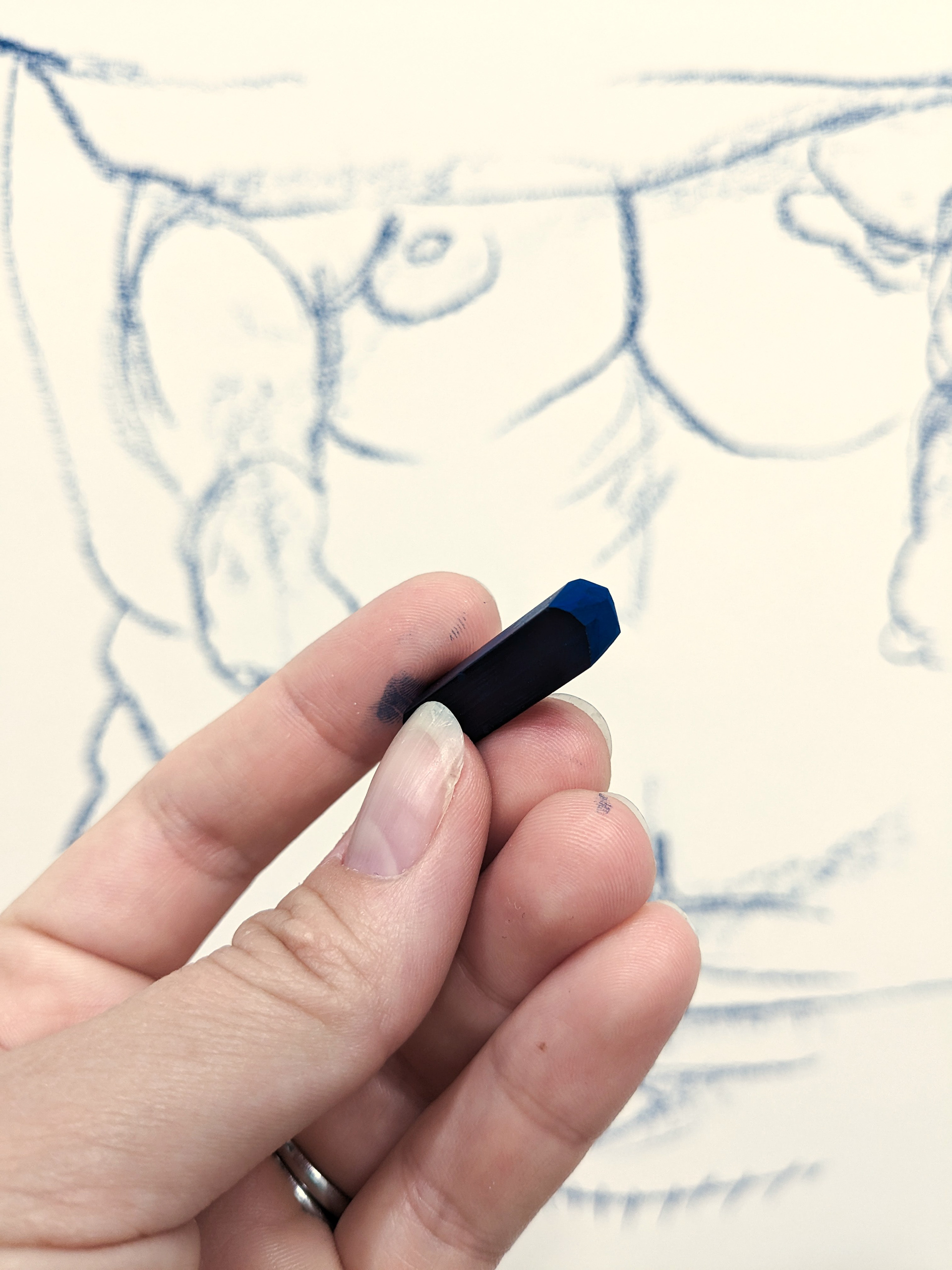 The indigo-colored hard pastel used for these drawings 