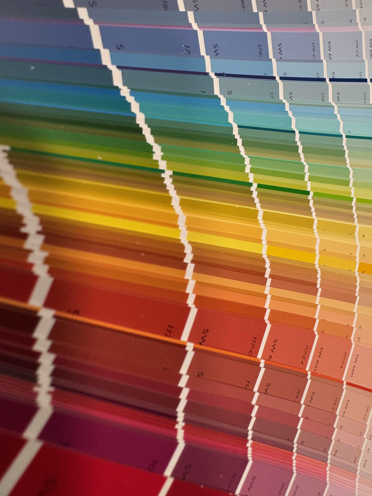 Fan deck pages. Organized the same as our wall, but a more portable, and artistic display of the colours we offer.