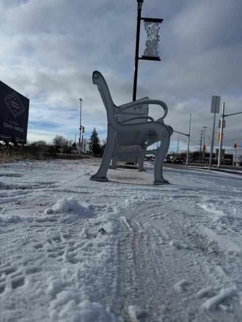 Snowy conditions make the bench an uncomfortable wait, especially given the lengths of transit commutes here in Ottawa.