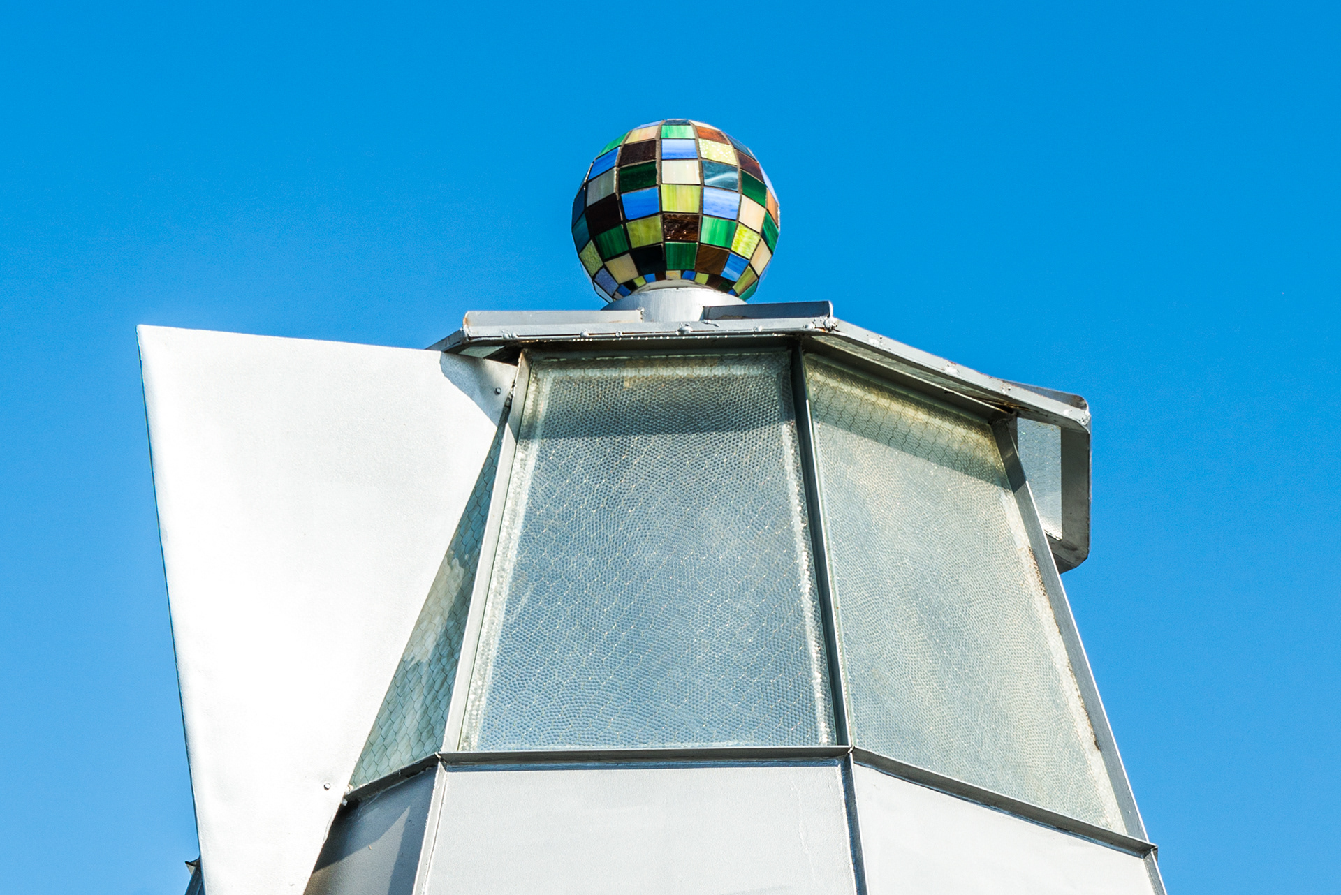 Not only does the new orb look beautiful atop the renovated building... it lights up at night!