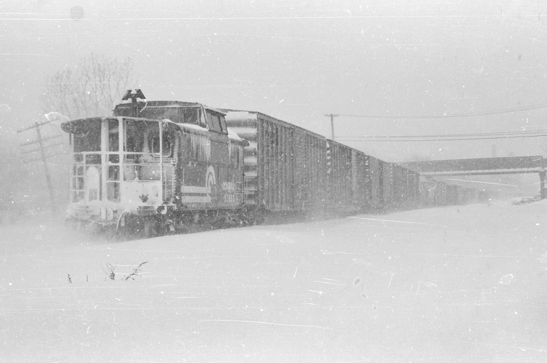 Conrail westbound through Palmyra, NY in the snow in Feb. 1978 during a blizzard that dumped 38" of snow on the area.