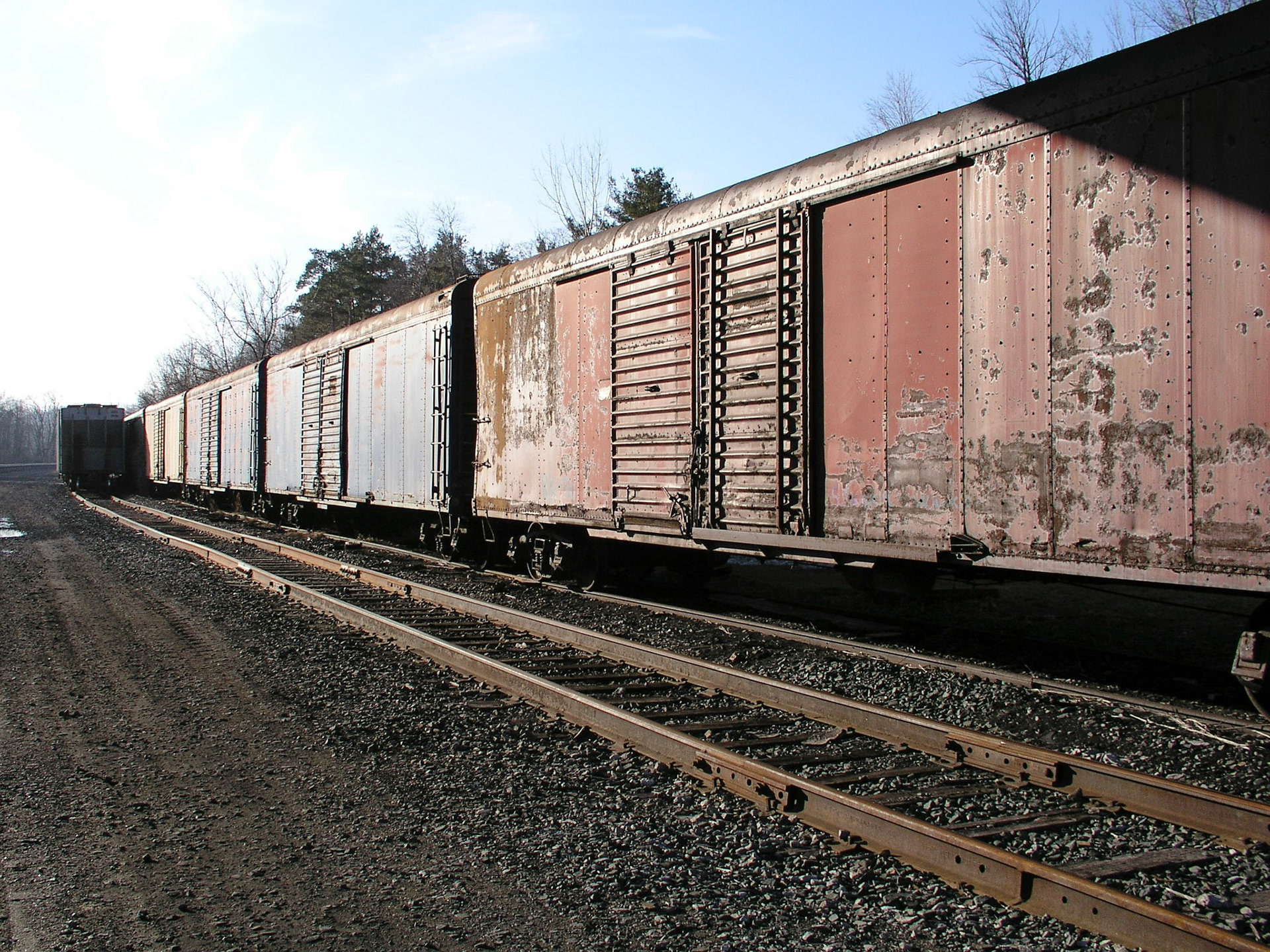 Old express boxcars under the Rte. 21 underpass in Palmyra, NY,  March 30, 2005