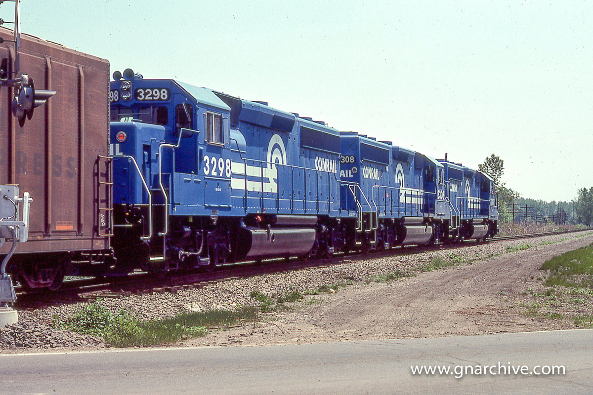 1:45 PM - EB on the West Shore with new CR GP-40-2's 3307, 3308, 3398 Fairport, NY - May 21, 1977