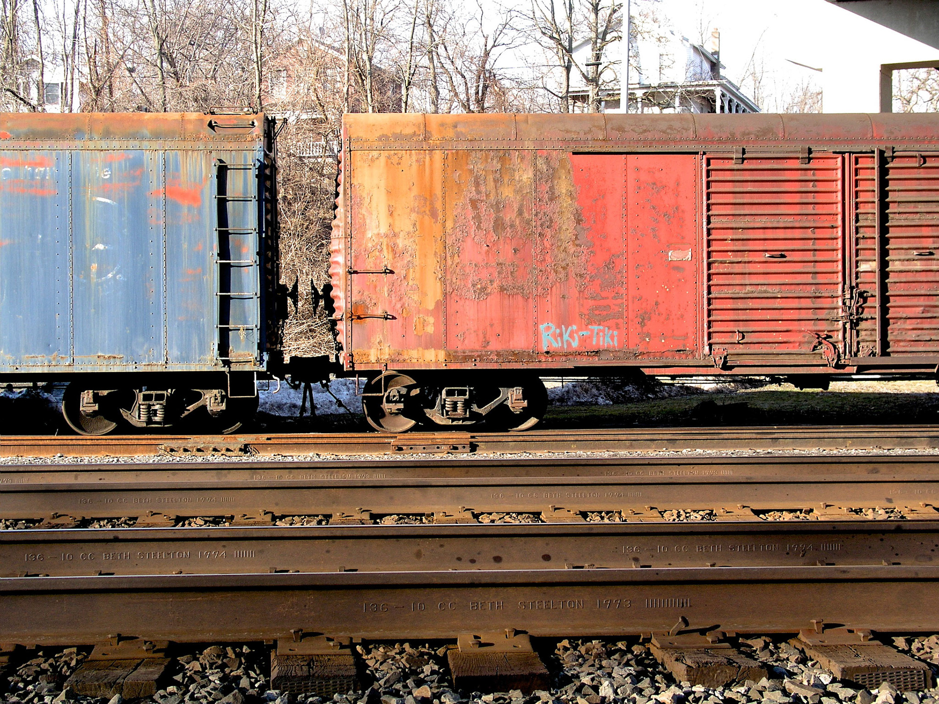 Old express boxcars under the Rte. 21 underpass in Palmyra, NY,  March 30, 2005