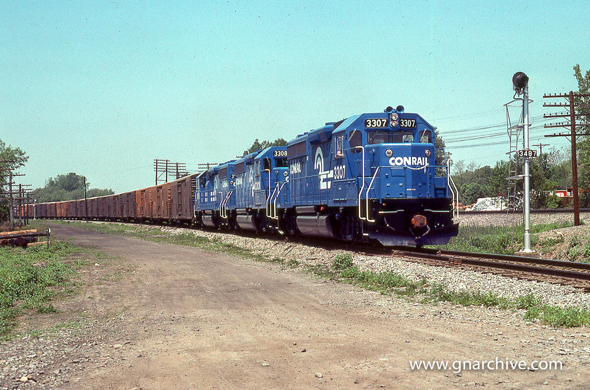 1:45 PM - EB on the West Shore with new CR GP-40-2's 3307, 3308, 3398 Fairport, NY - May 21, 1977