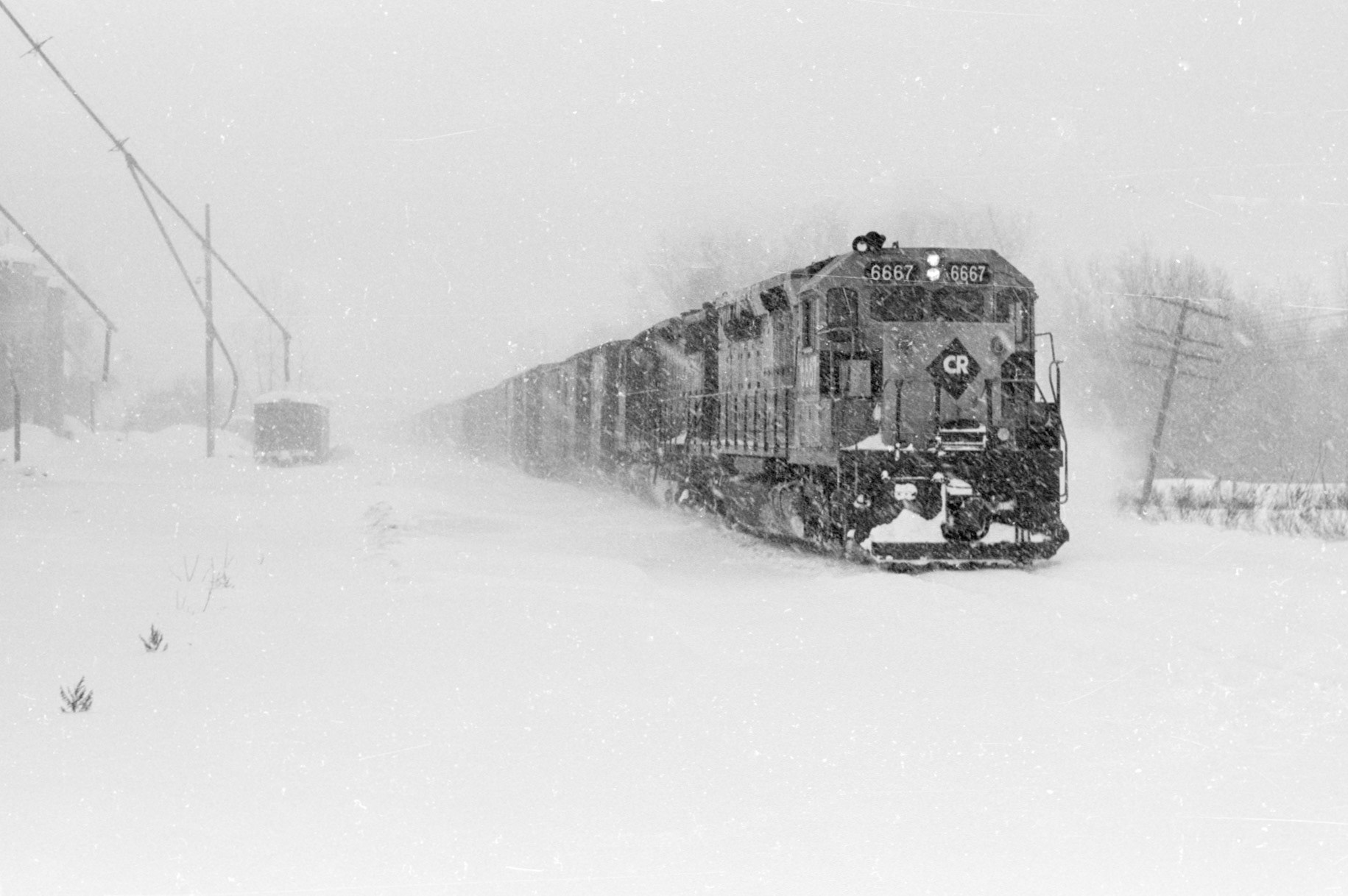 Conrail westbound through Palmyra, NY in the snow in Feb. 1978 during a blizzard that dumped 38" of snow on the area.