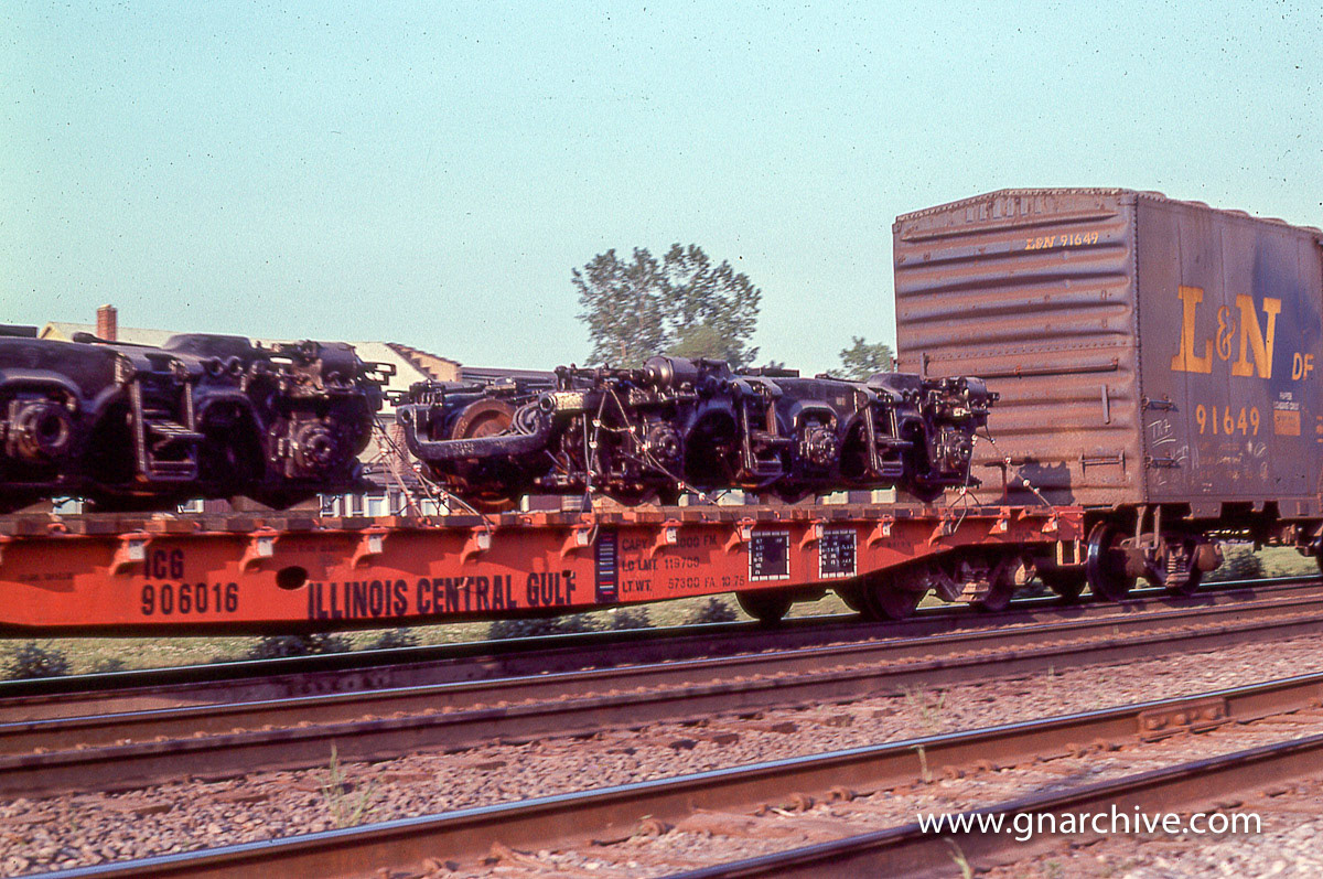 7:13 PM - E-unit trucks on a flatcar
