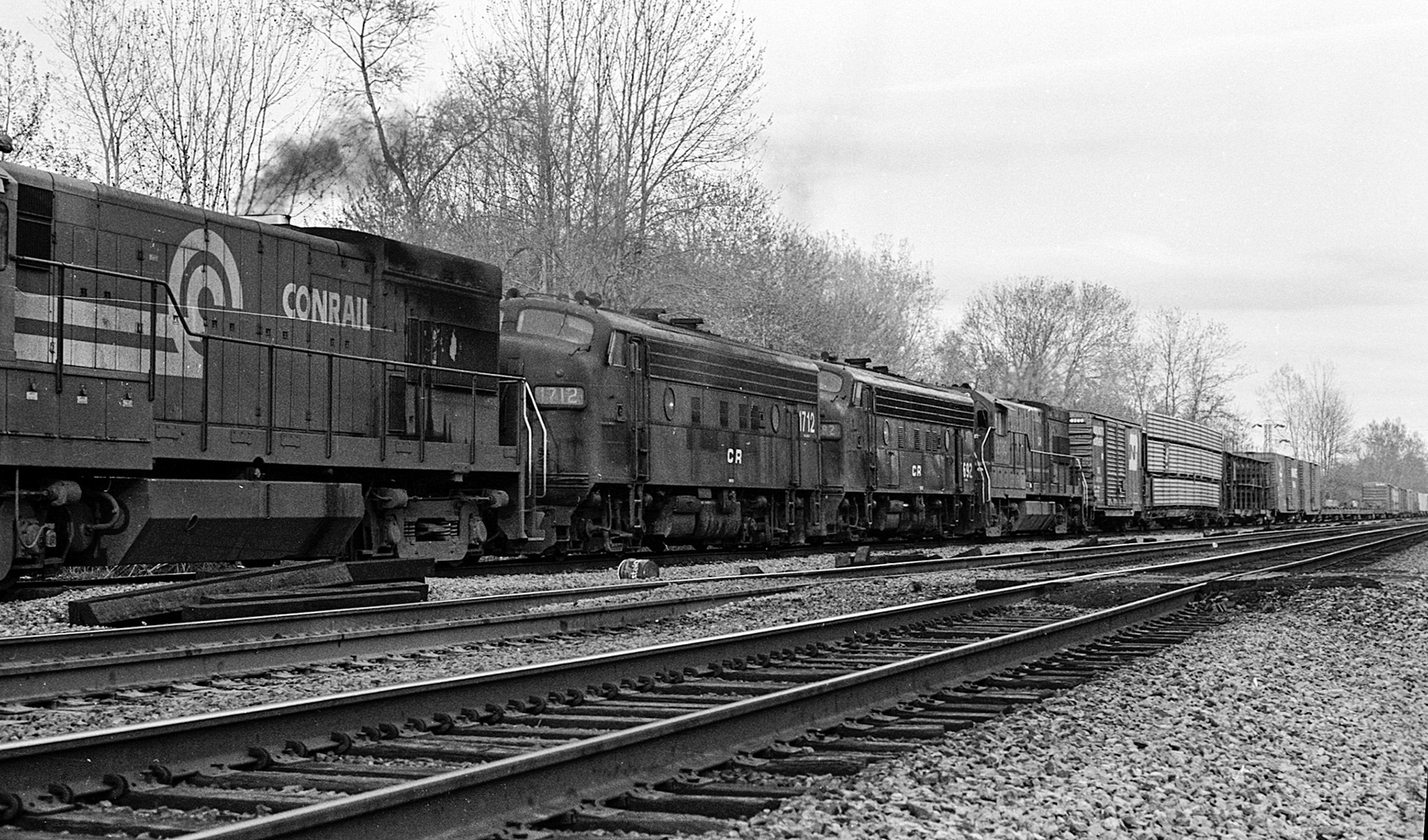 A westbound with two F-units on the controlled siding.