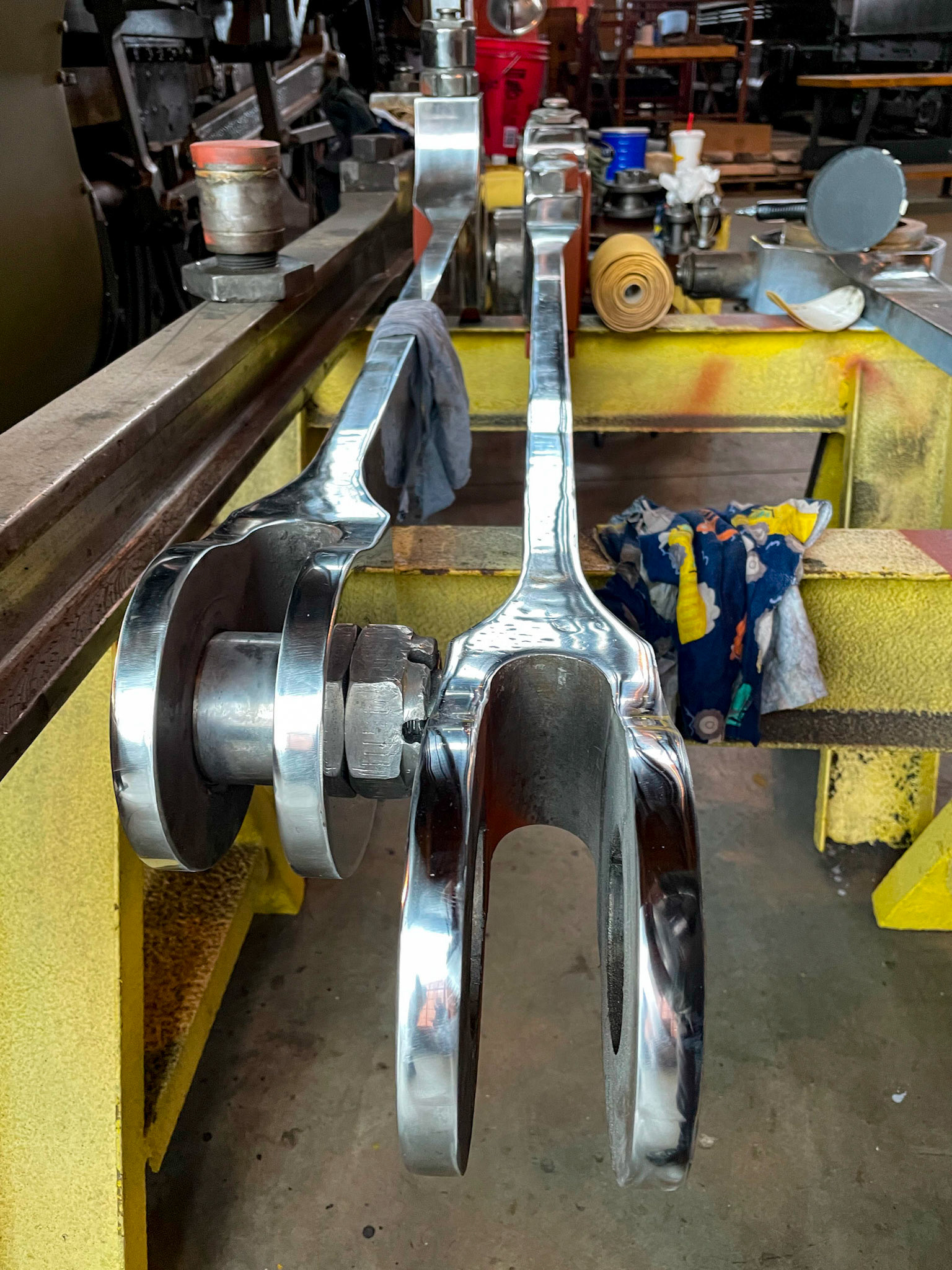 Polished side rods ready to install at the Age of Steam roundhouse, Jan. 13, 2022
