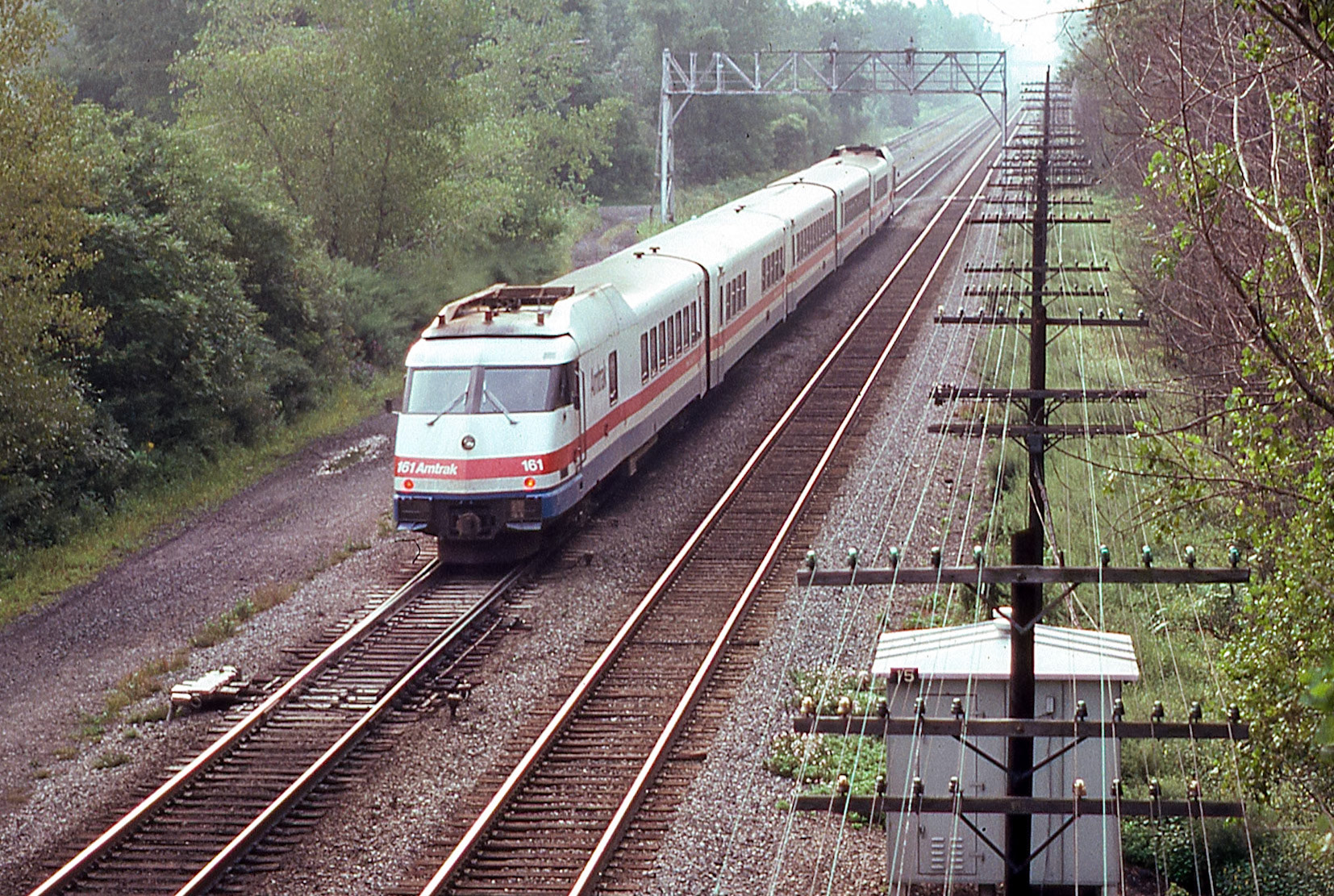 Amtrak train 73 westbound at CP15, Newark, N.Y. on Sept. 3 1977.