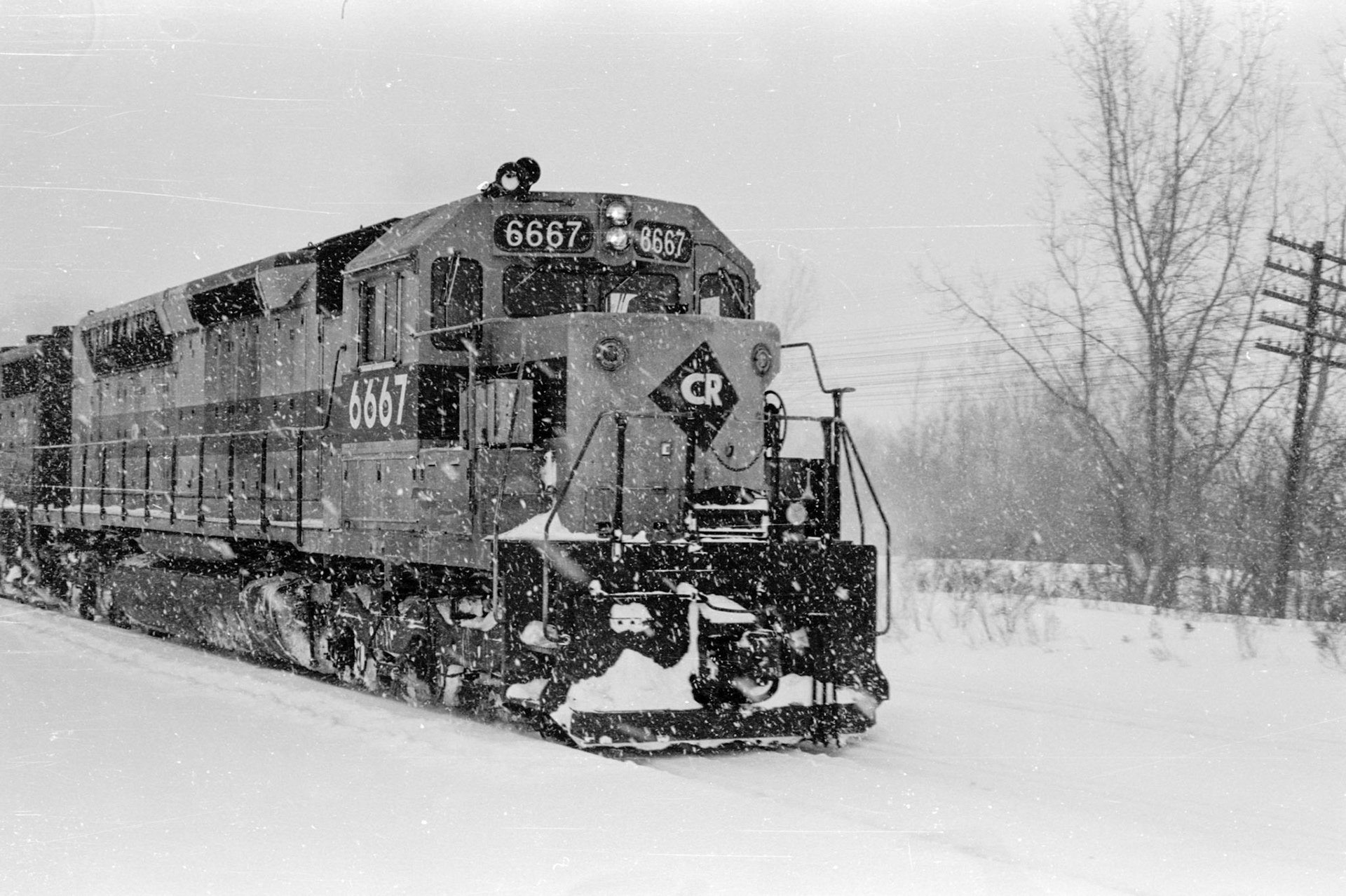 Conrail westbound through Palmyra, NY in the snow in Feb. 1978 during a blizzard that dumped 38" of snow on the area.