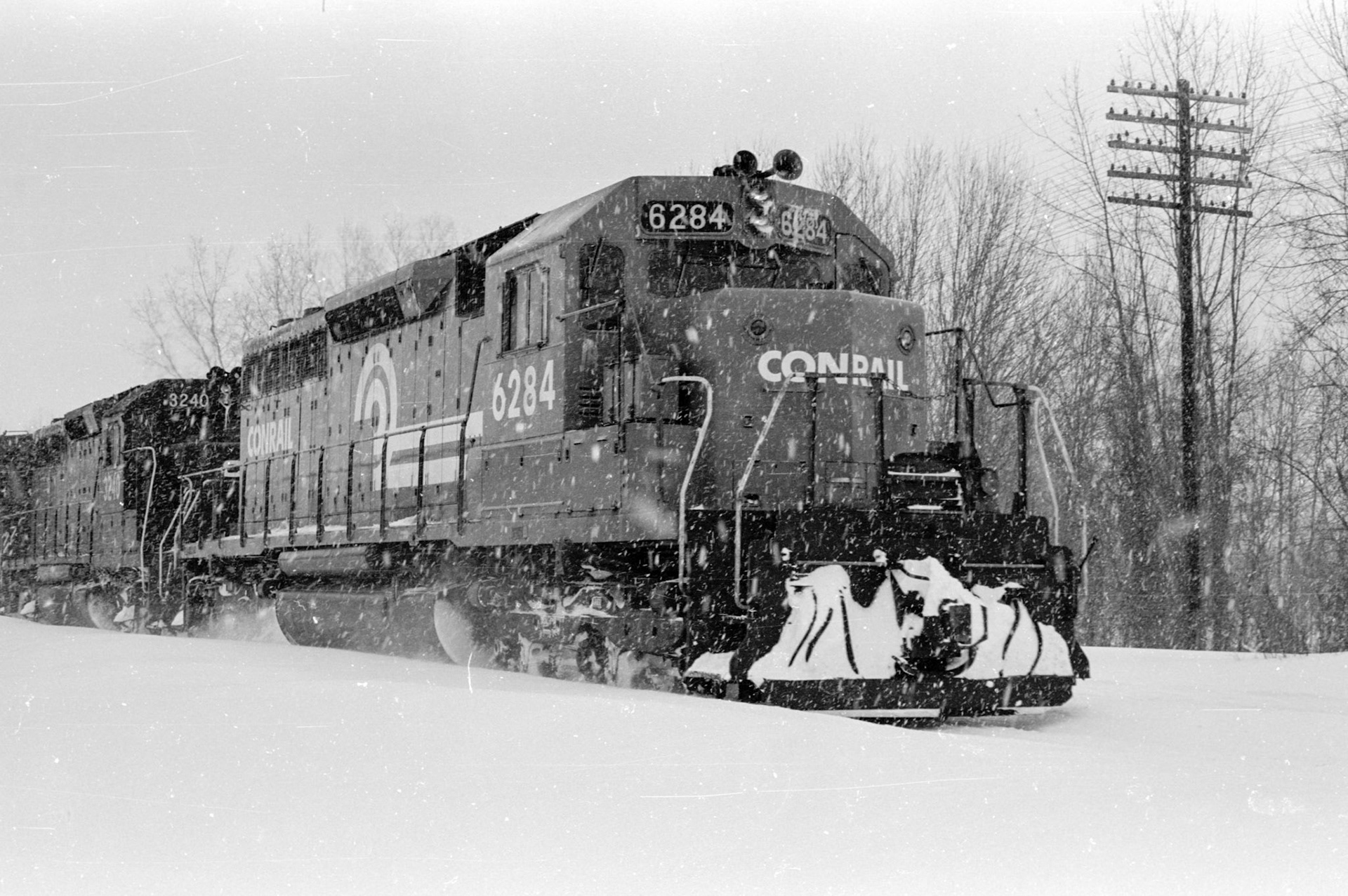 Conrail westbound through Palmyra, NY in the snow in Feb. 1978 during a blizzard that dumped 38" of snow on the area.