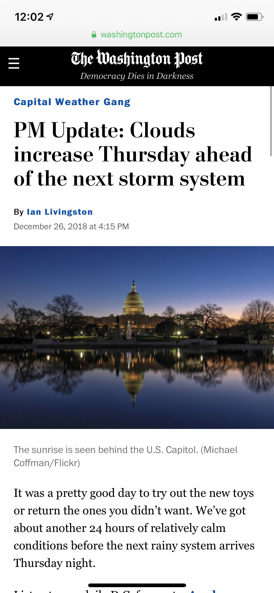 Sun rising behind the U.S. Capitol