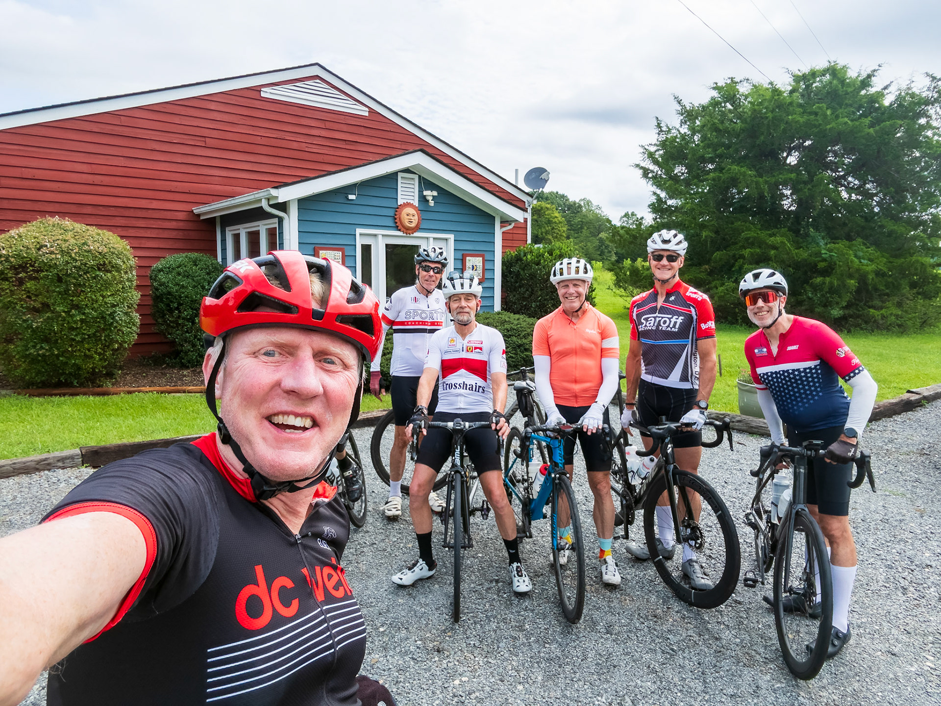 Group photo before our Day 2 ride, Bill's hidden behind my big head.