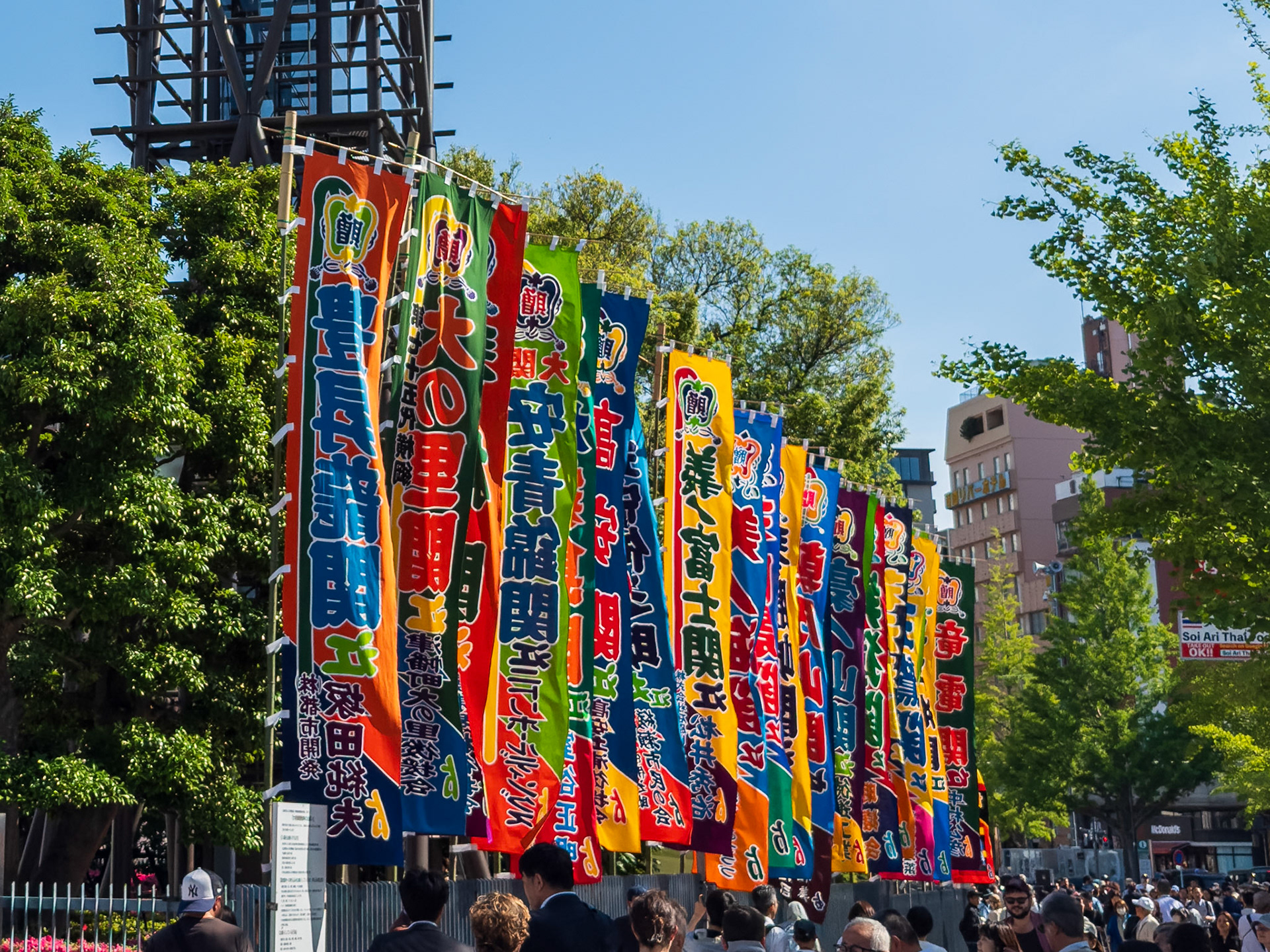 Banners for each of the wrestlers outside the stadium