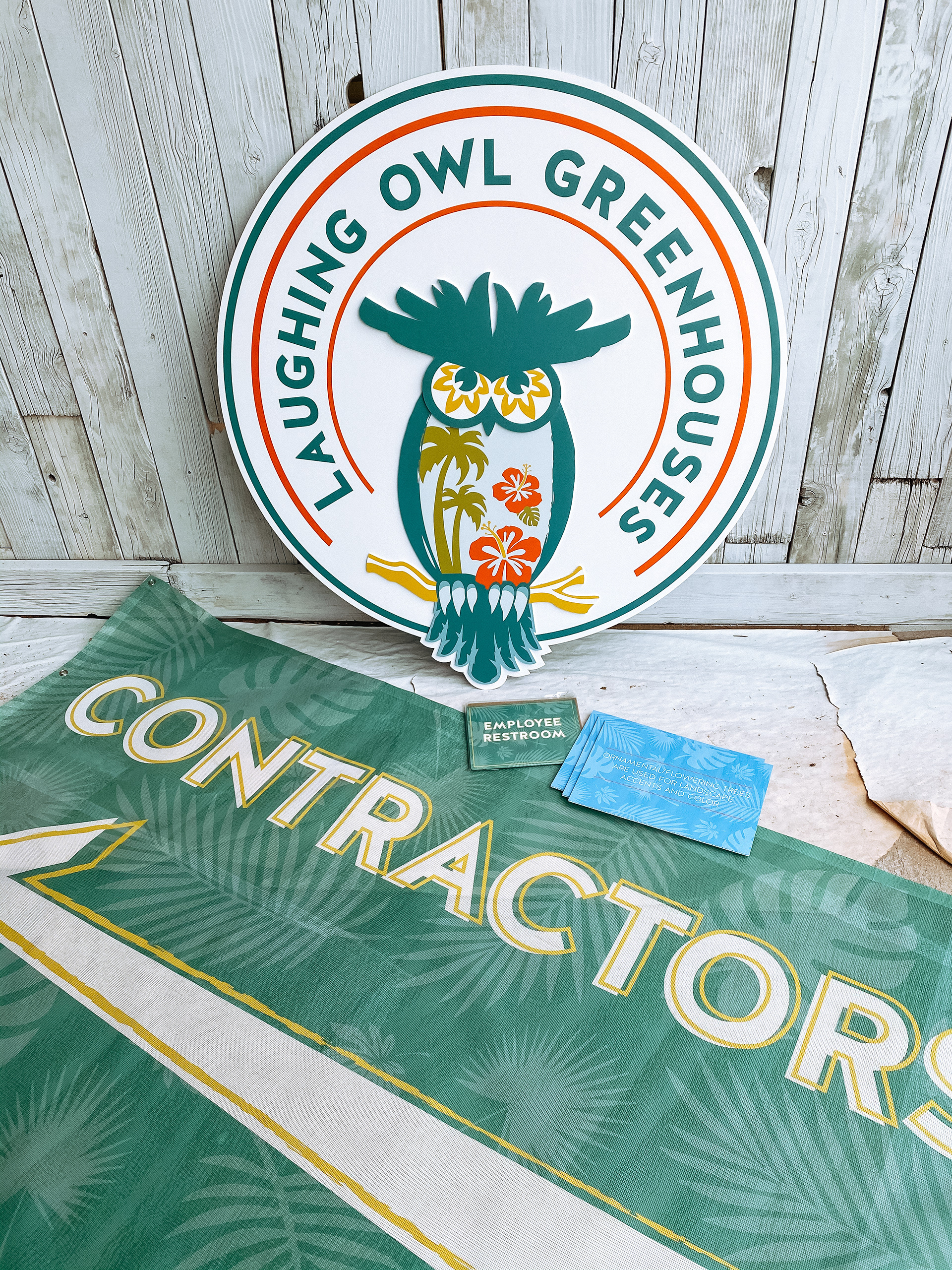 Various signage designs used to organize different areas of the greenhouse property. Large logo was placed inside the greenhouse main store area.