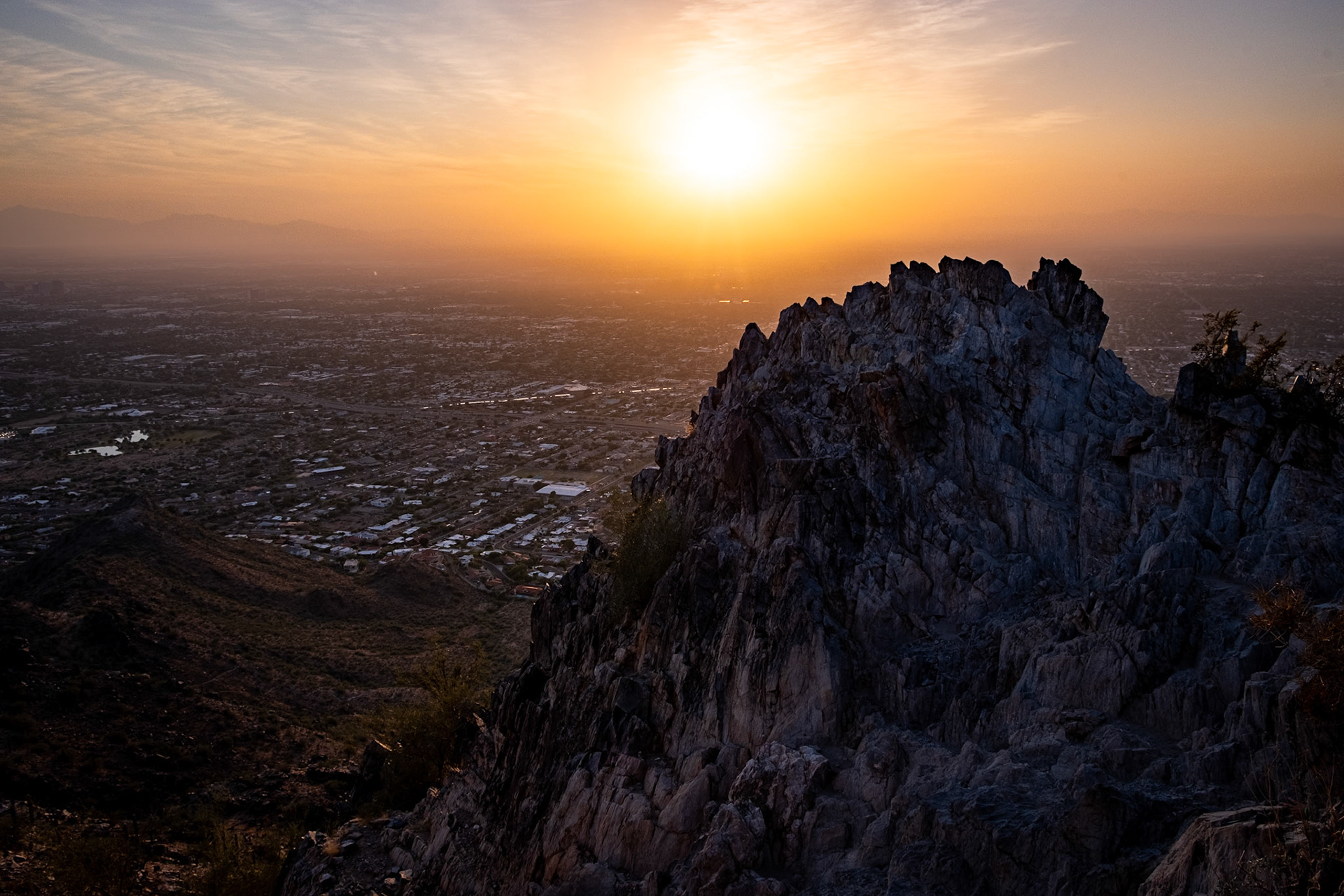 Watching sunset from the mountain top. They say it's extremely rare to not see the mountains but it still was an amazing sunset.