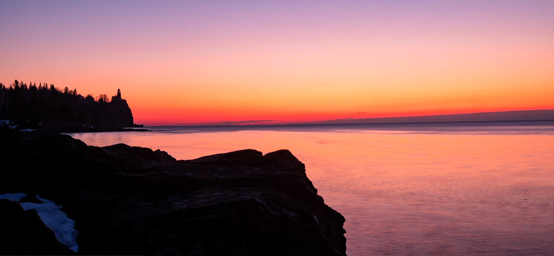 Good morning Split Rock Lighthouse - Wishing there were more clouds to really make the sunrise more interesting, I looked  for a more abstract approach to capture the sunrise.