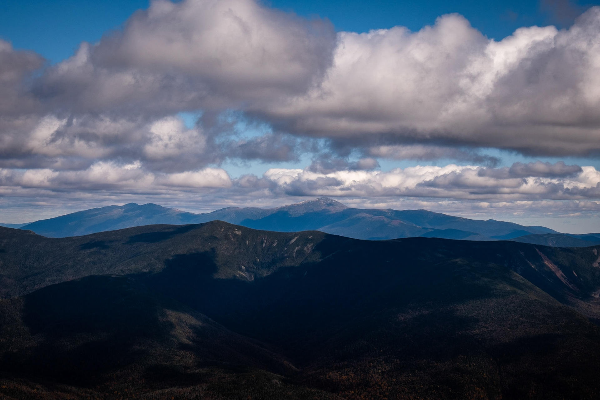 Mt. Washington, is that snow? Stay away for a few more days. The forground ridge is the other side of the loop. My way back.