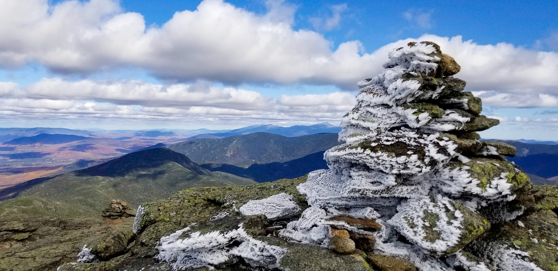 More wind frost covering this rock cairn.