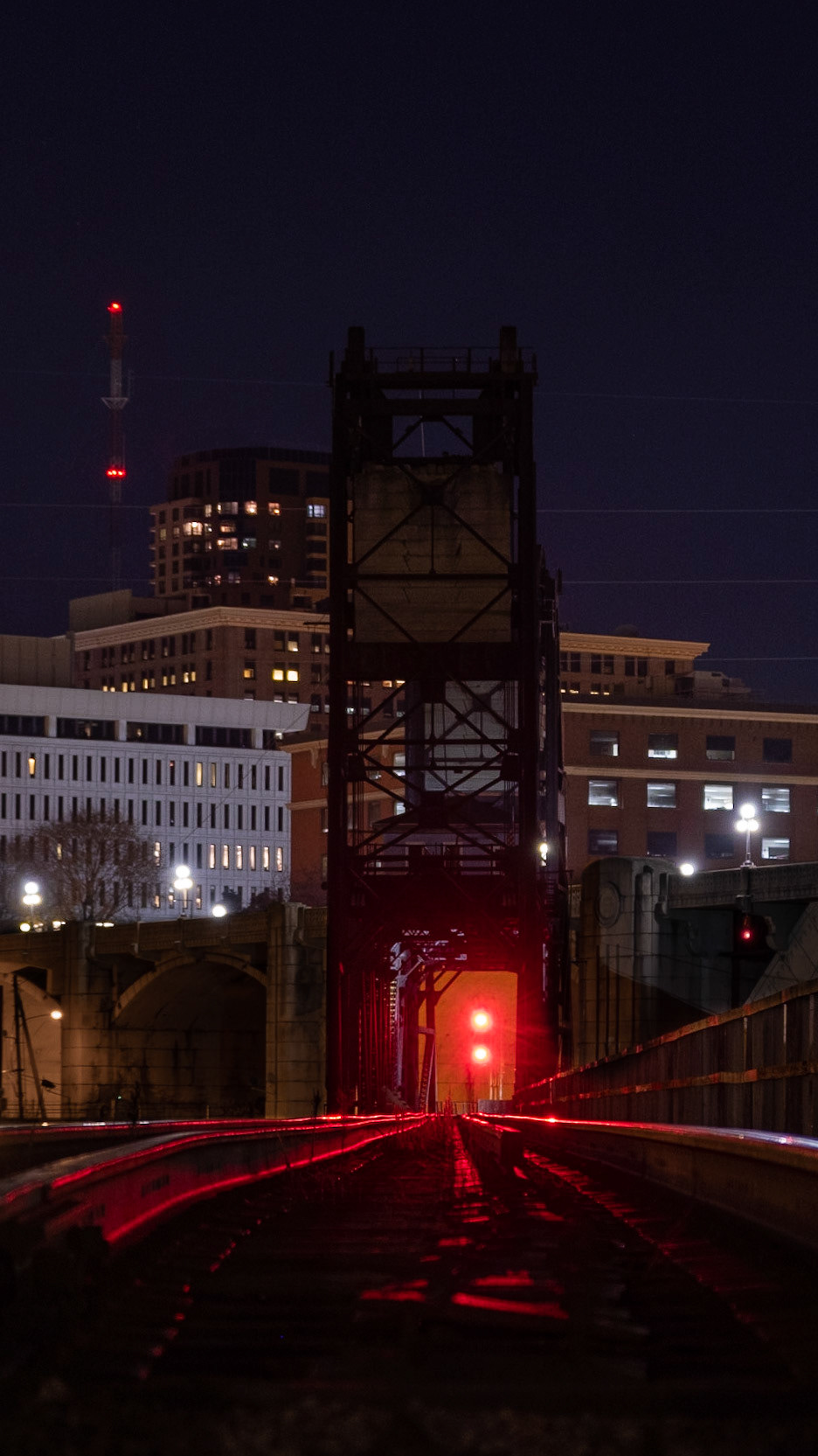 Walking by this track, it was a must to capture with these red lights punching through the nights darkness.