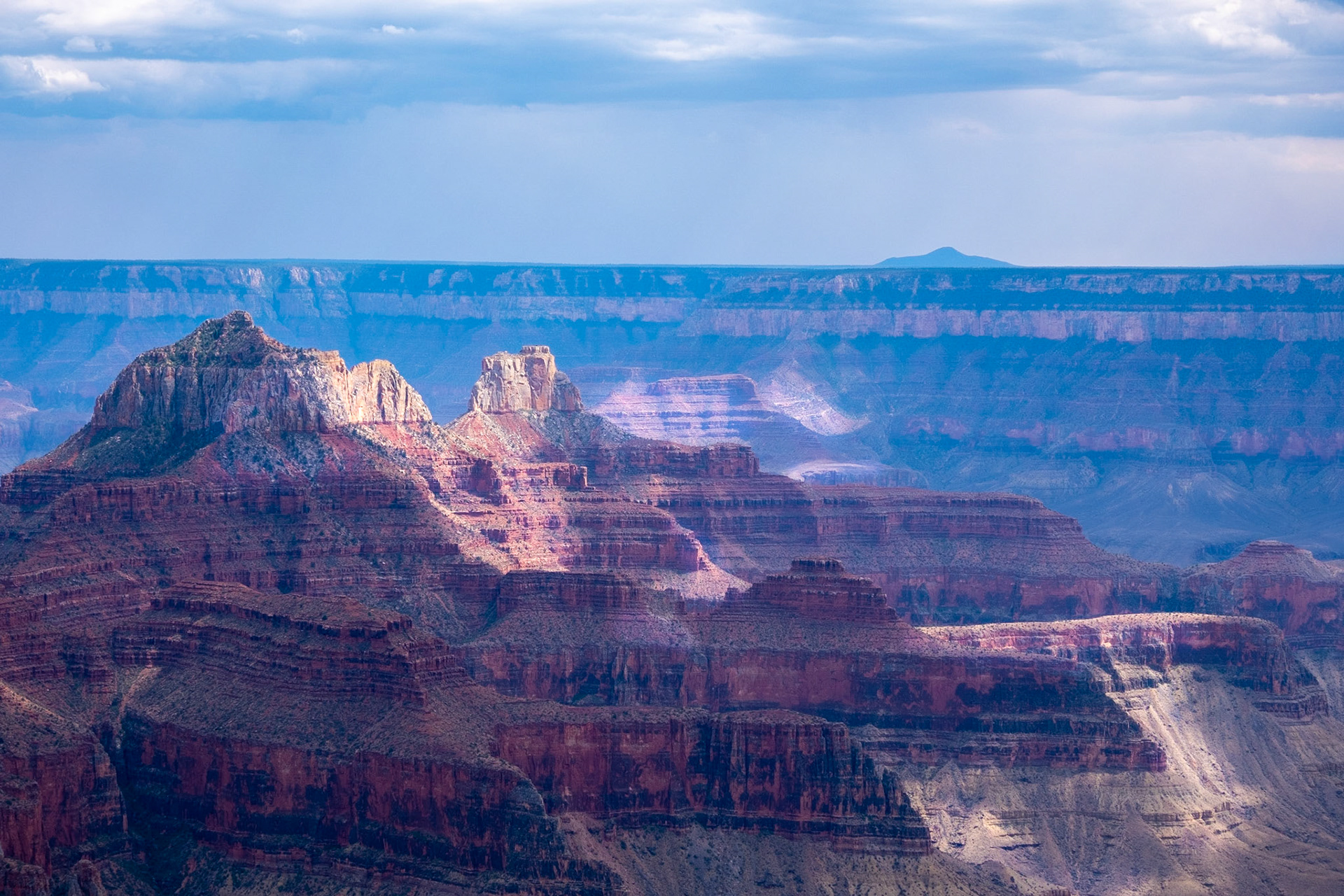 Most people: Look at the grandour of this canyon.  The heart of a wonderer: I wonder what mountain that is out there... notes next adventure idea.