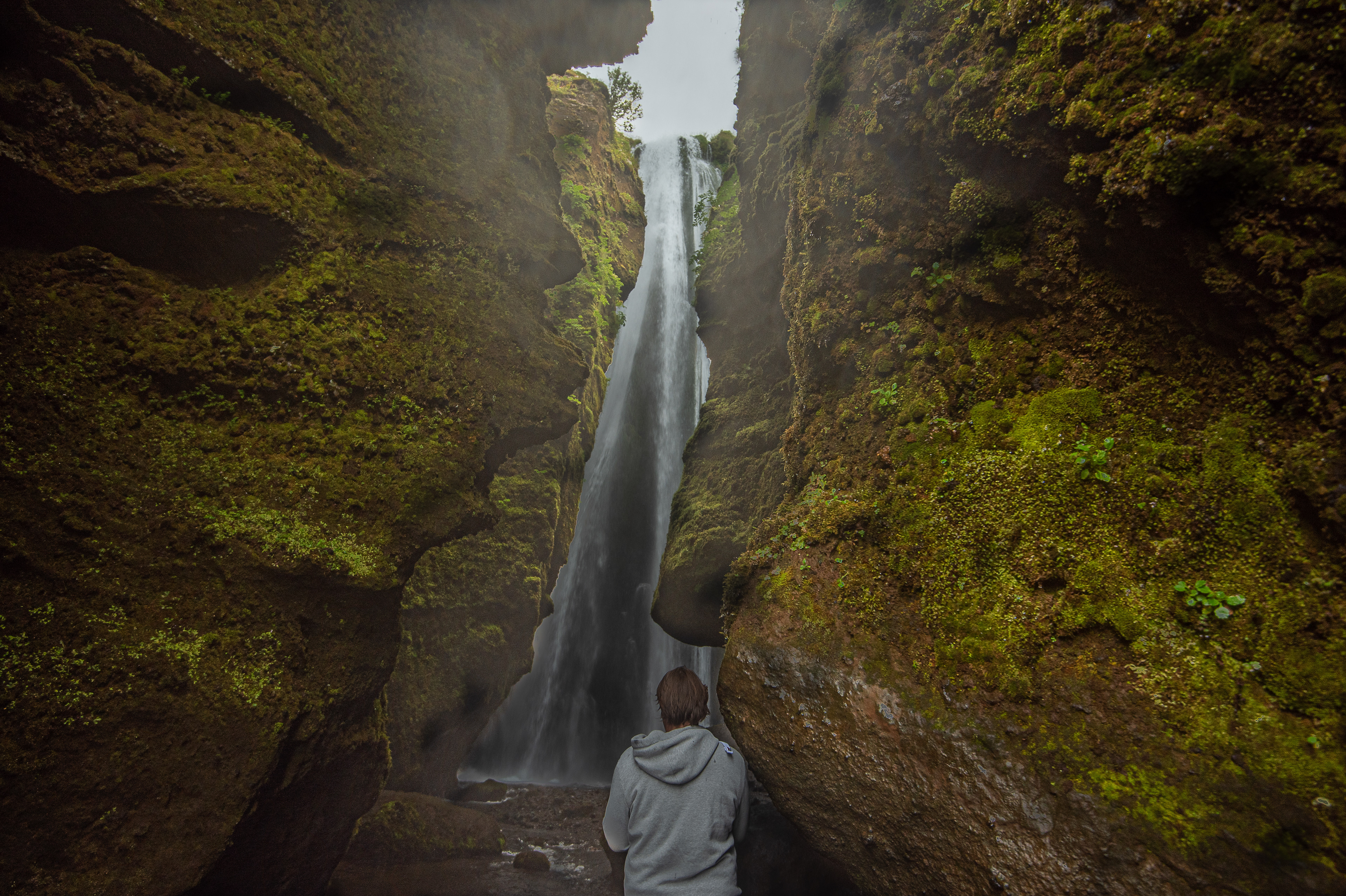 Standing at the entrance of he ravine where the stream falls down as a waterfall