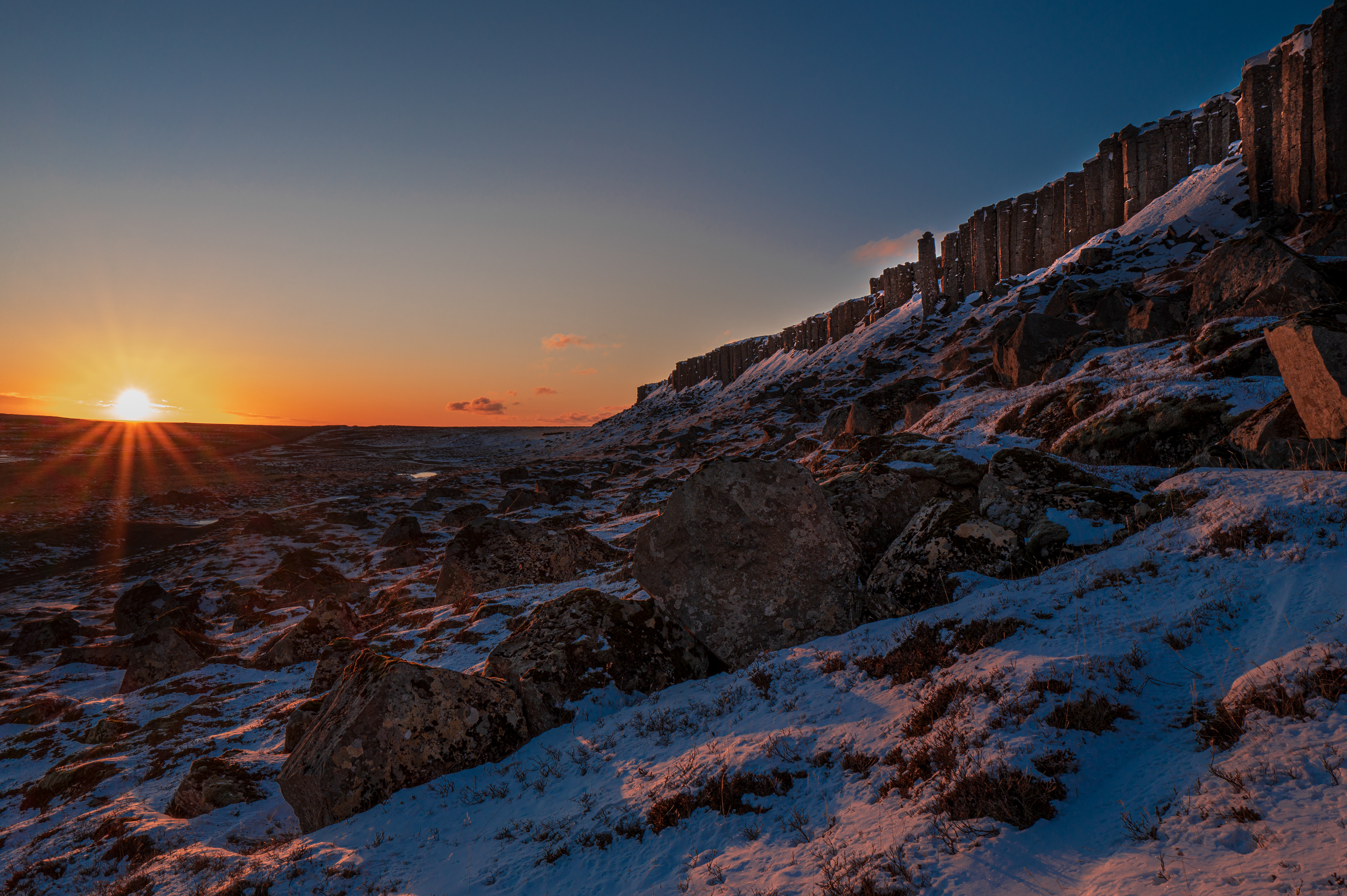 Sunset by Gerðuberg Cliffs
