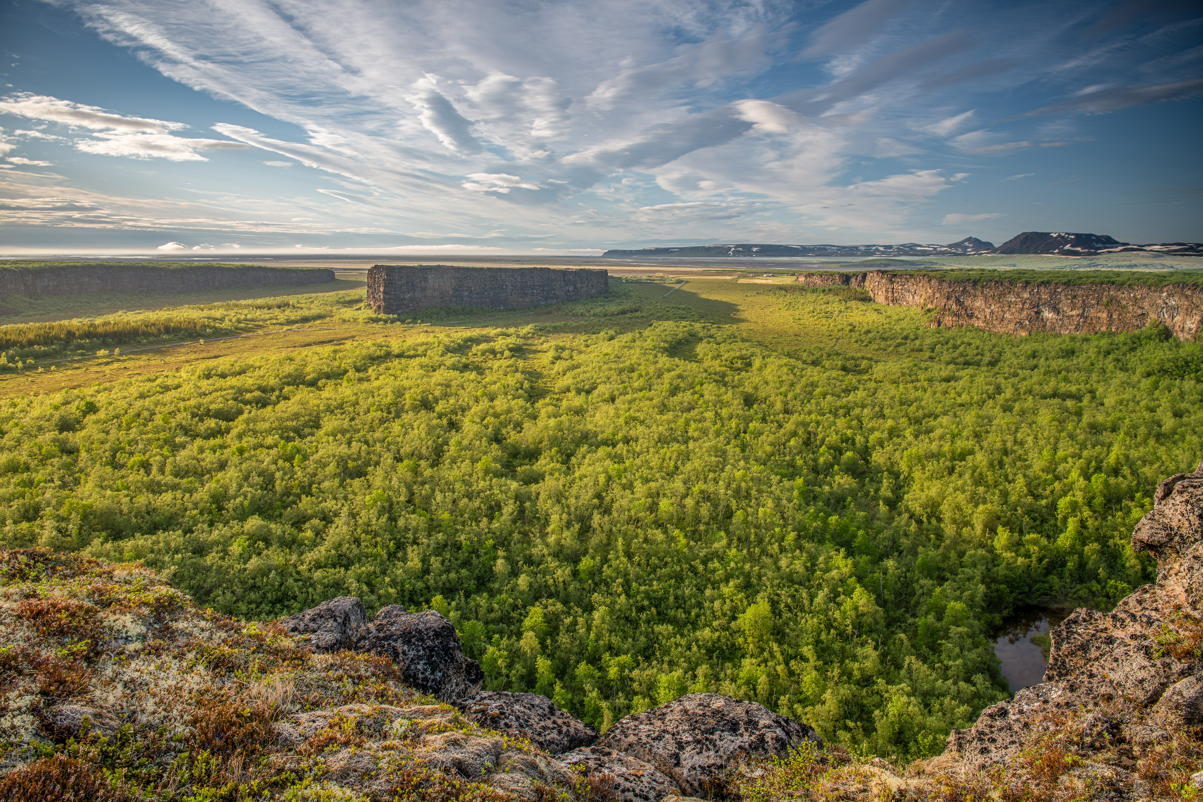 The area looks likeFrom above, Ásbyrgi looks like a horseshoe and is often referred to as a step from Odin's horse Sleipnir a horse shue and is often refered to as a step from Odins horse Sleipnir