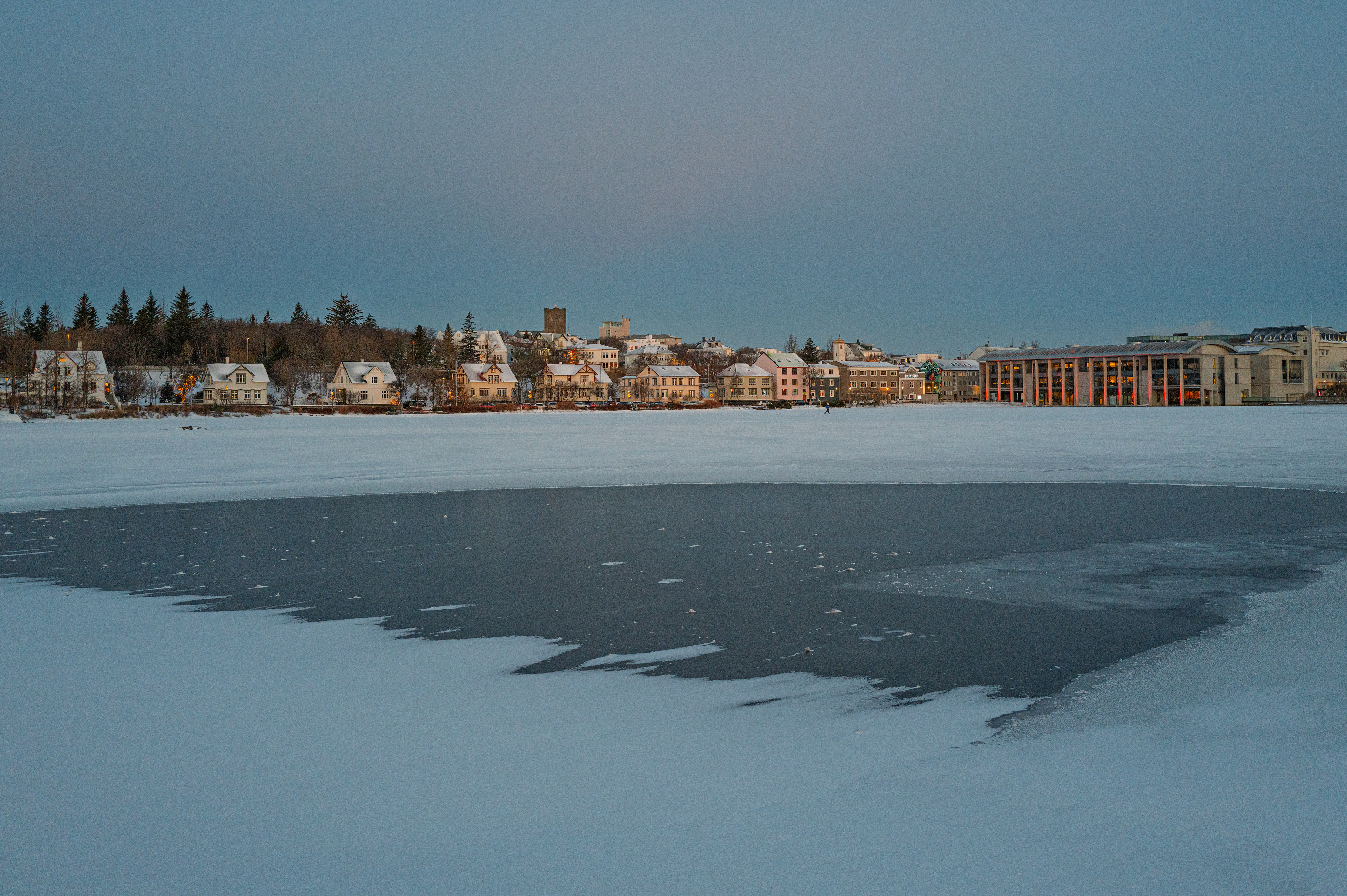 Tjarnargata in winter and the City Hall of Reykjavík
