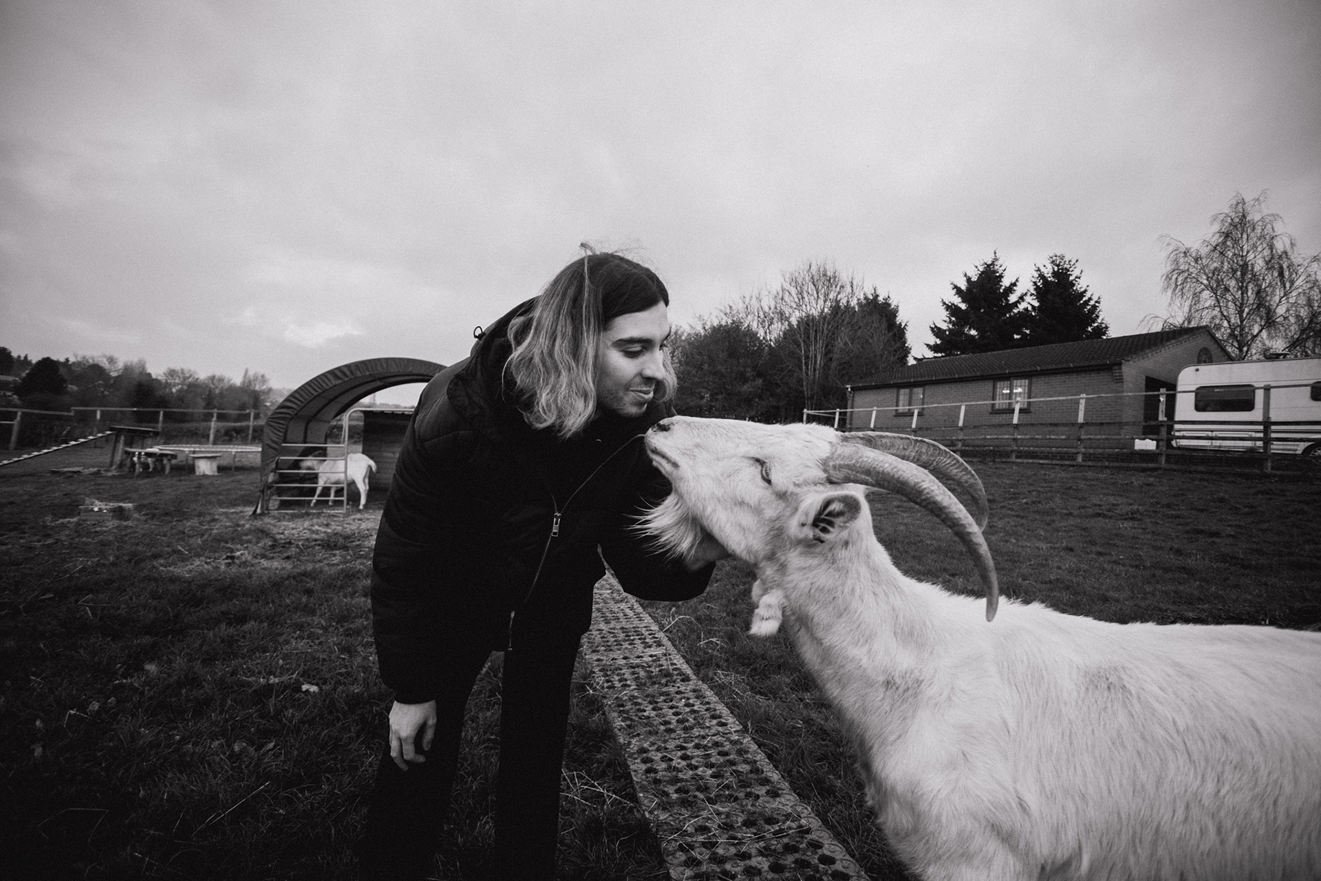 Author Ed Winters (Earthling Ed) with goat Brian, Surge Sanctuary animal rescue