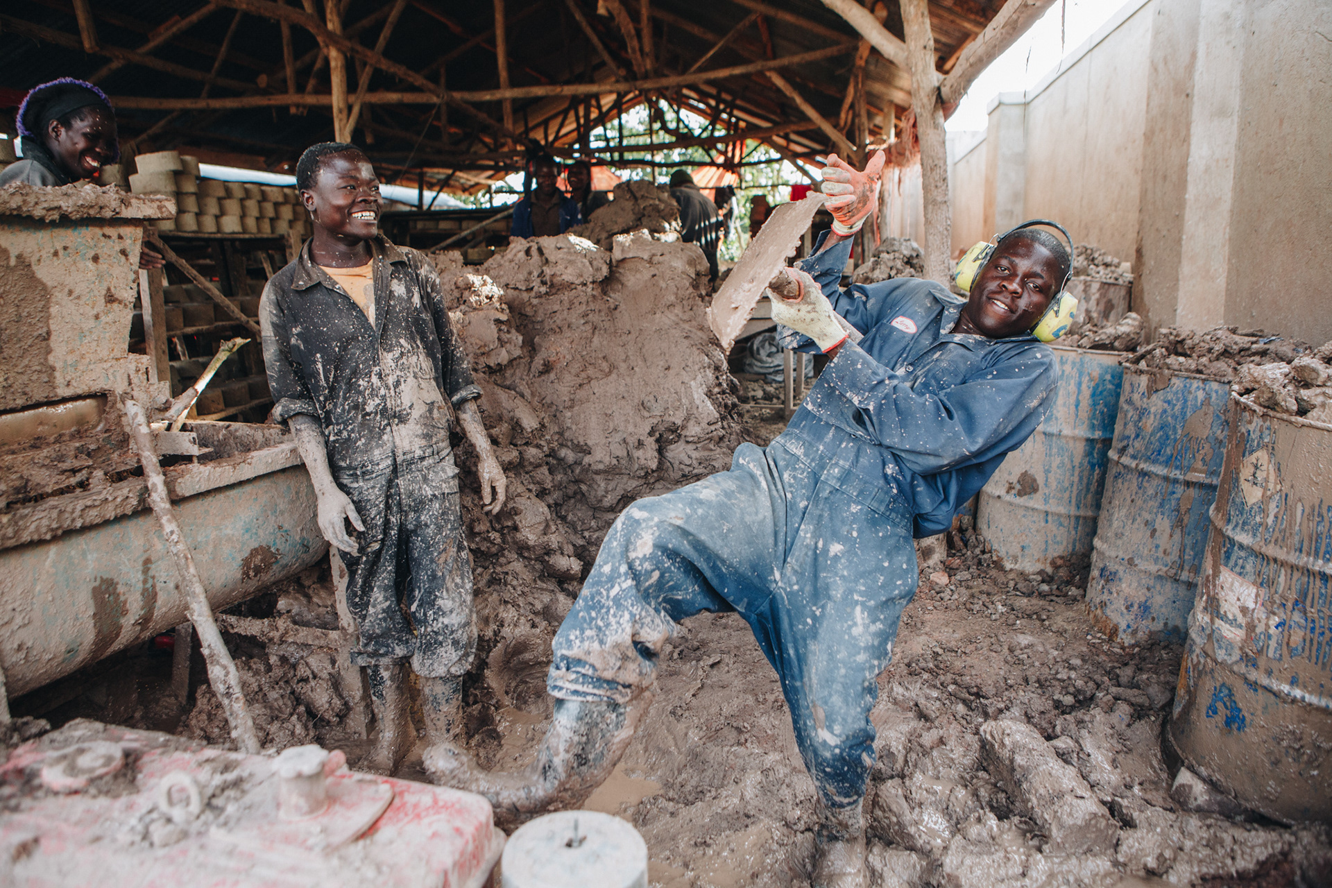 Workers at Bio-fuel facility, Uganda - editorial for non-profit Yunus Social Business (YSB)