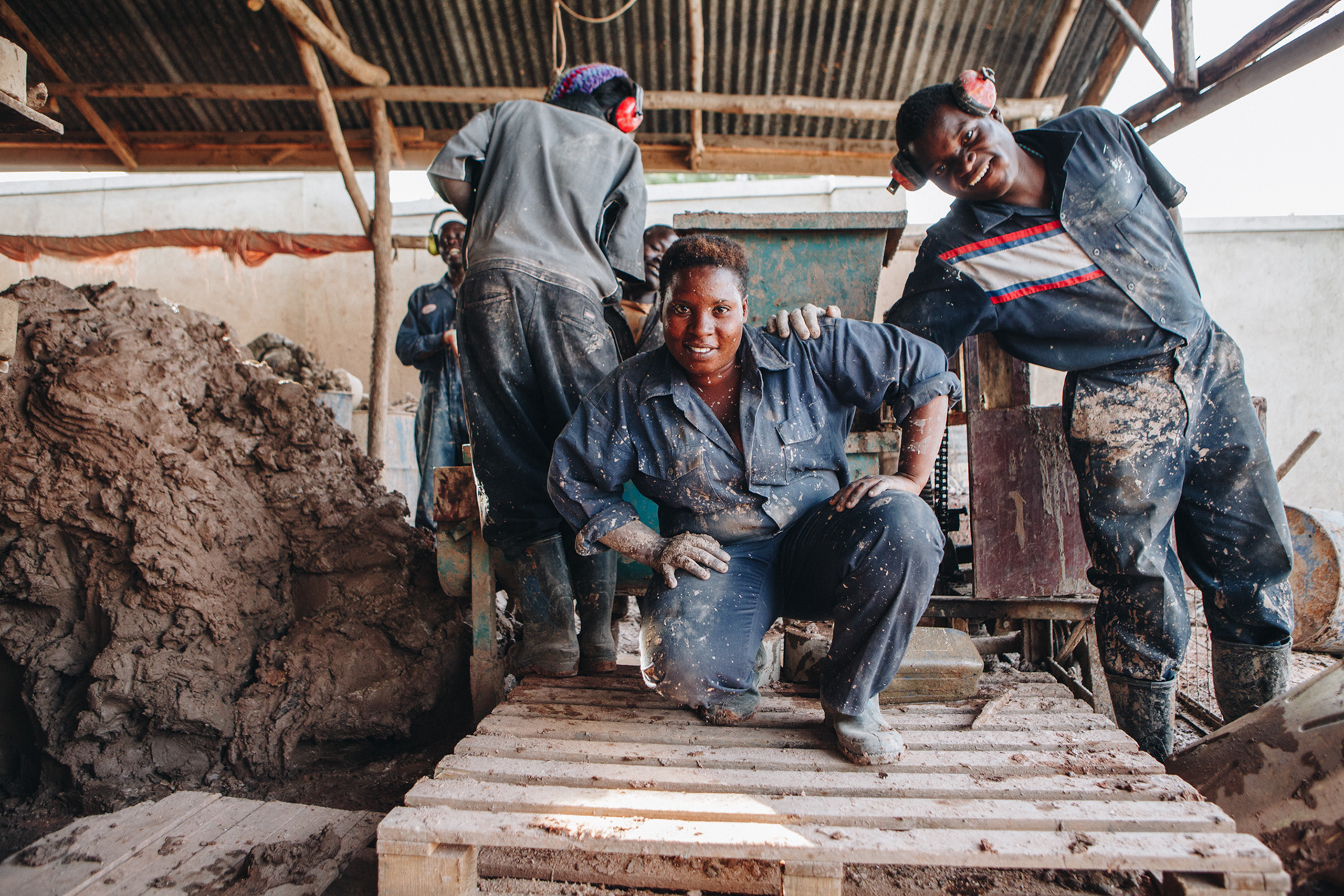 Workers at Bio-fuel facility, Uganda - editorial for non-profit Yunus Social Business (YSB)