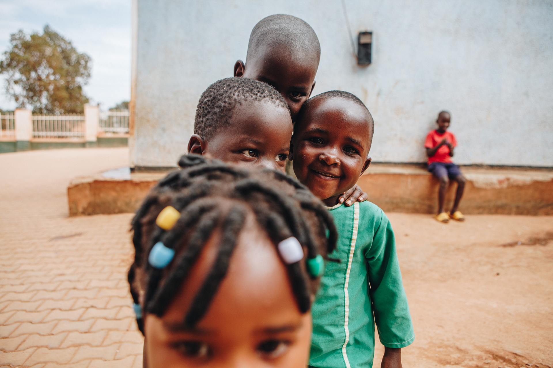 Students at school in Uganda - editorial for non-profit Yunus Social Business (YSB)