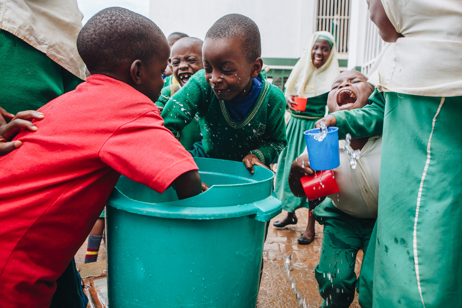 Clean drinking water at school in Uganda - editorial for non-profit Yunus Social Business (YSB)