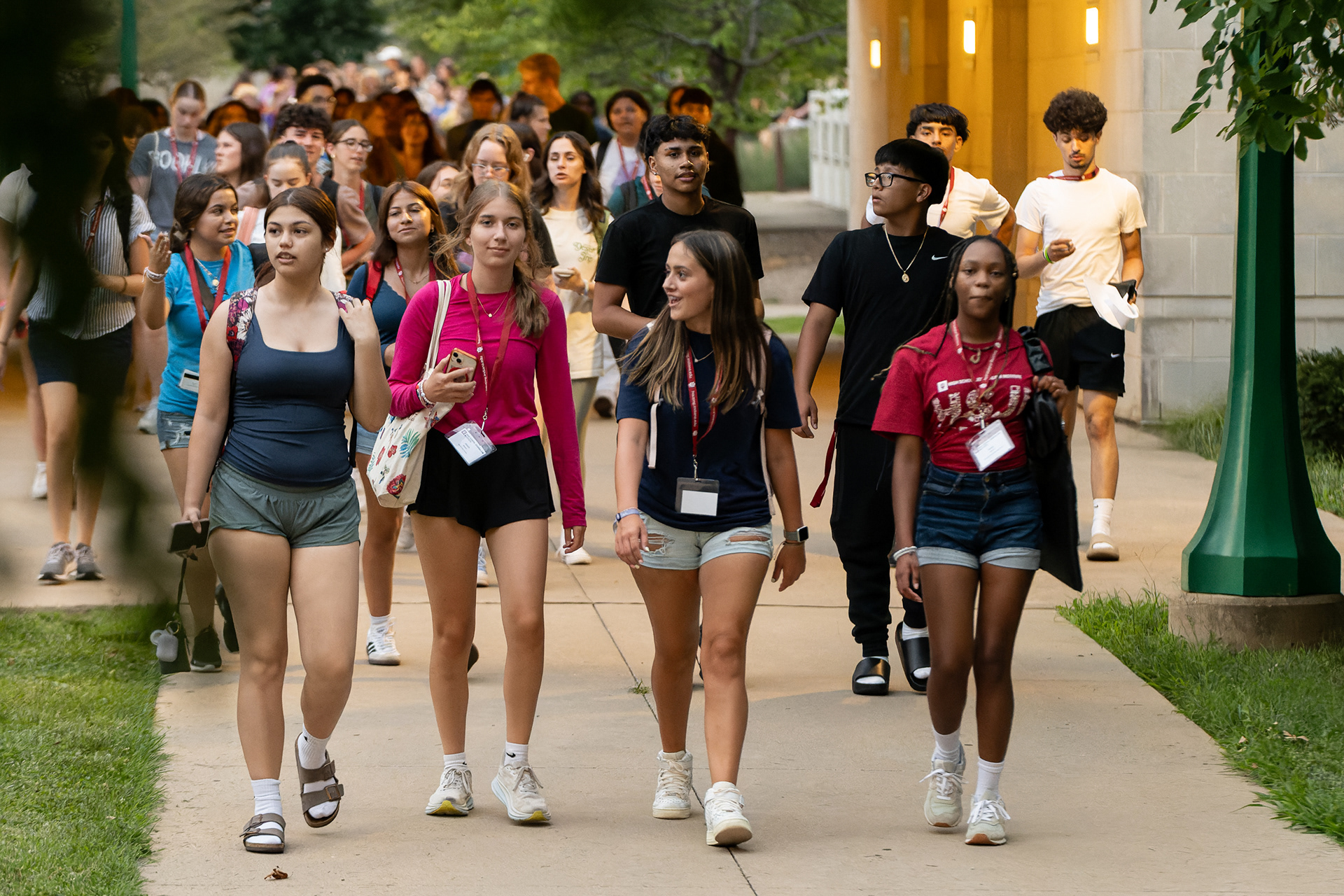 Students walk back to Spruce Residence Hall from Union Street Center after a 9 p.m. meeting during the first day of the Indiana University High School Journalism Institute, July 8, 2024, in Bloomington, Ind. The weeklong Institute gives high school students the opportunity to improve their journalism skills and get a preview of university life. (Vincent Hsiao/HSJI)