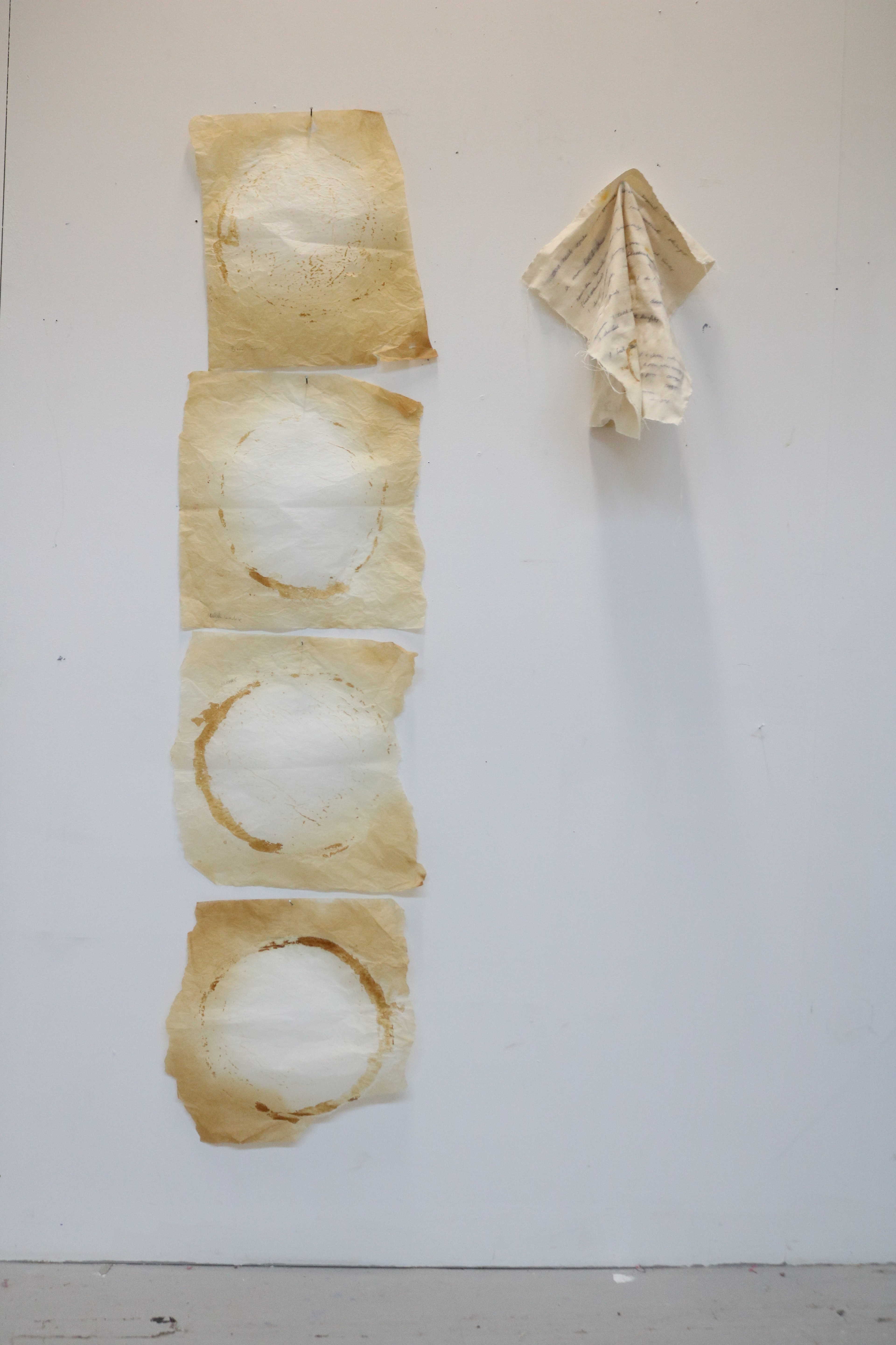 the parchment paper from when I baked all our loaves. a handmade tea towel of words they wrote.