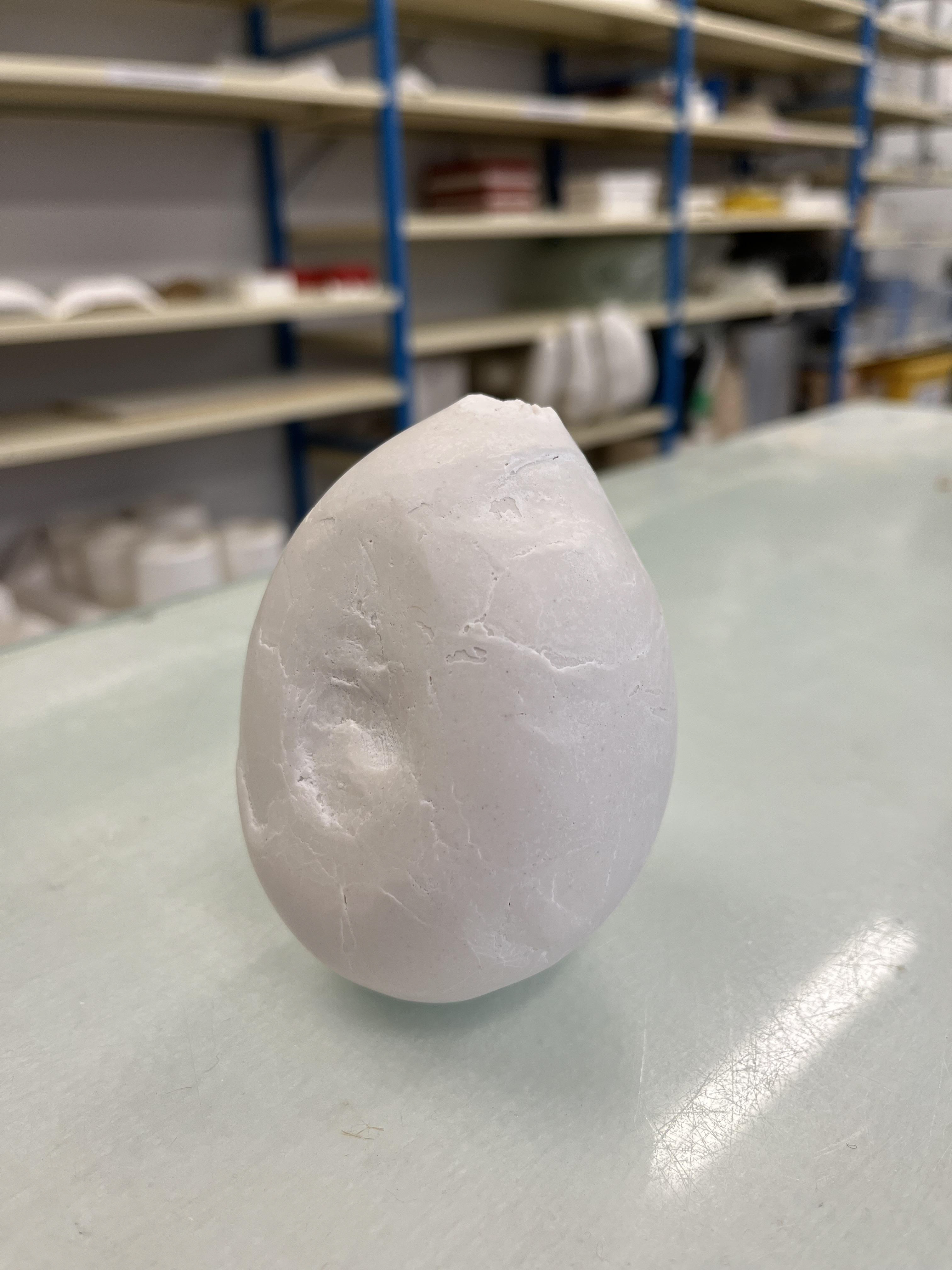 The first attempt to fill a balloon with plaster. Quickly realized that the pressure of pouring plaster was not enough to expand the balloon.