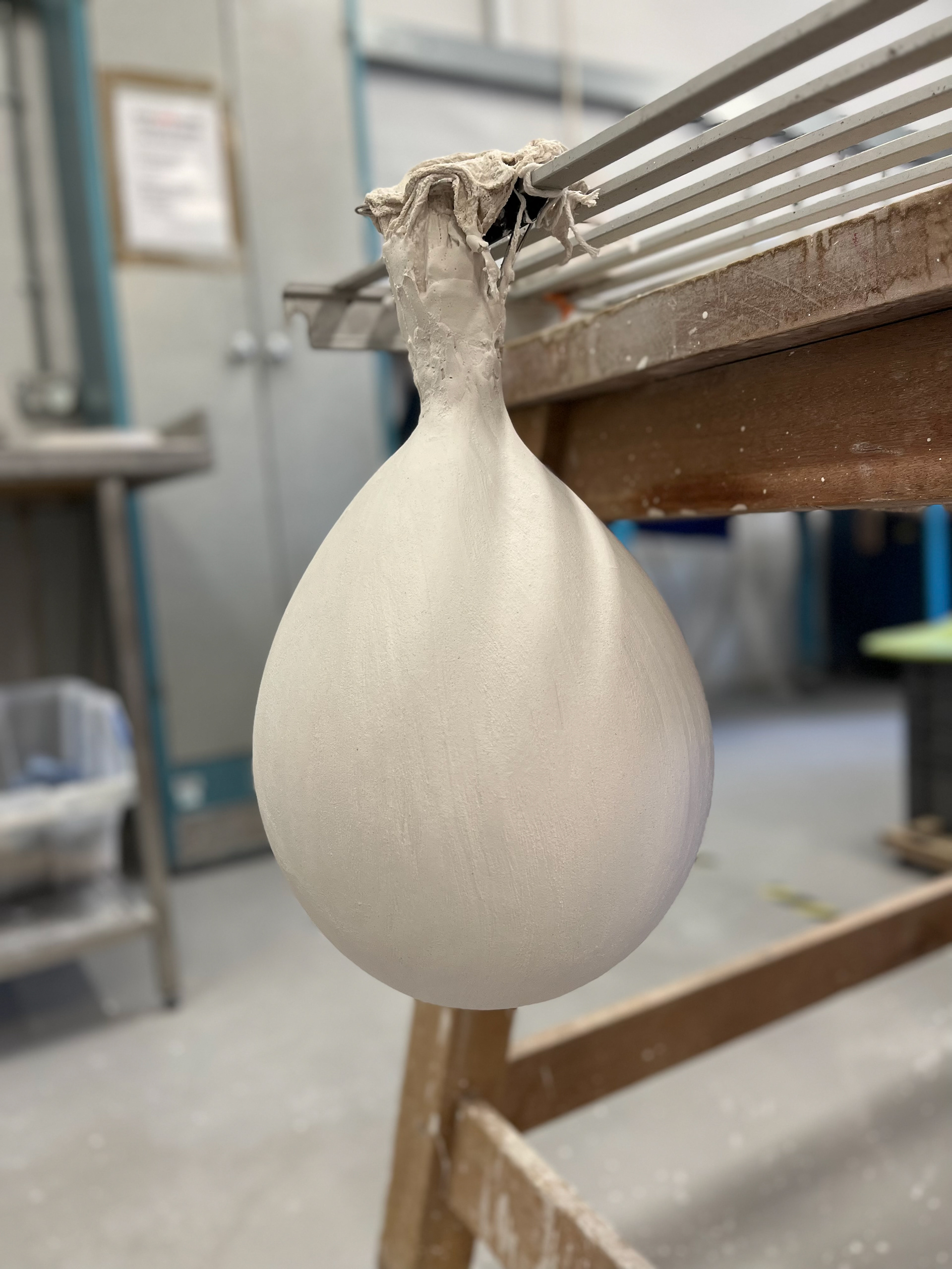 After much plotting and planning, decided on making the first part (the balloon positive) by inflating a balloon and coating it with multiple layers of plaster.