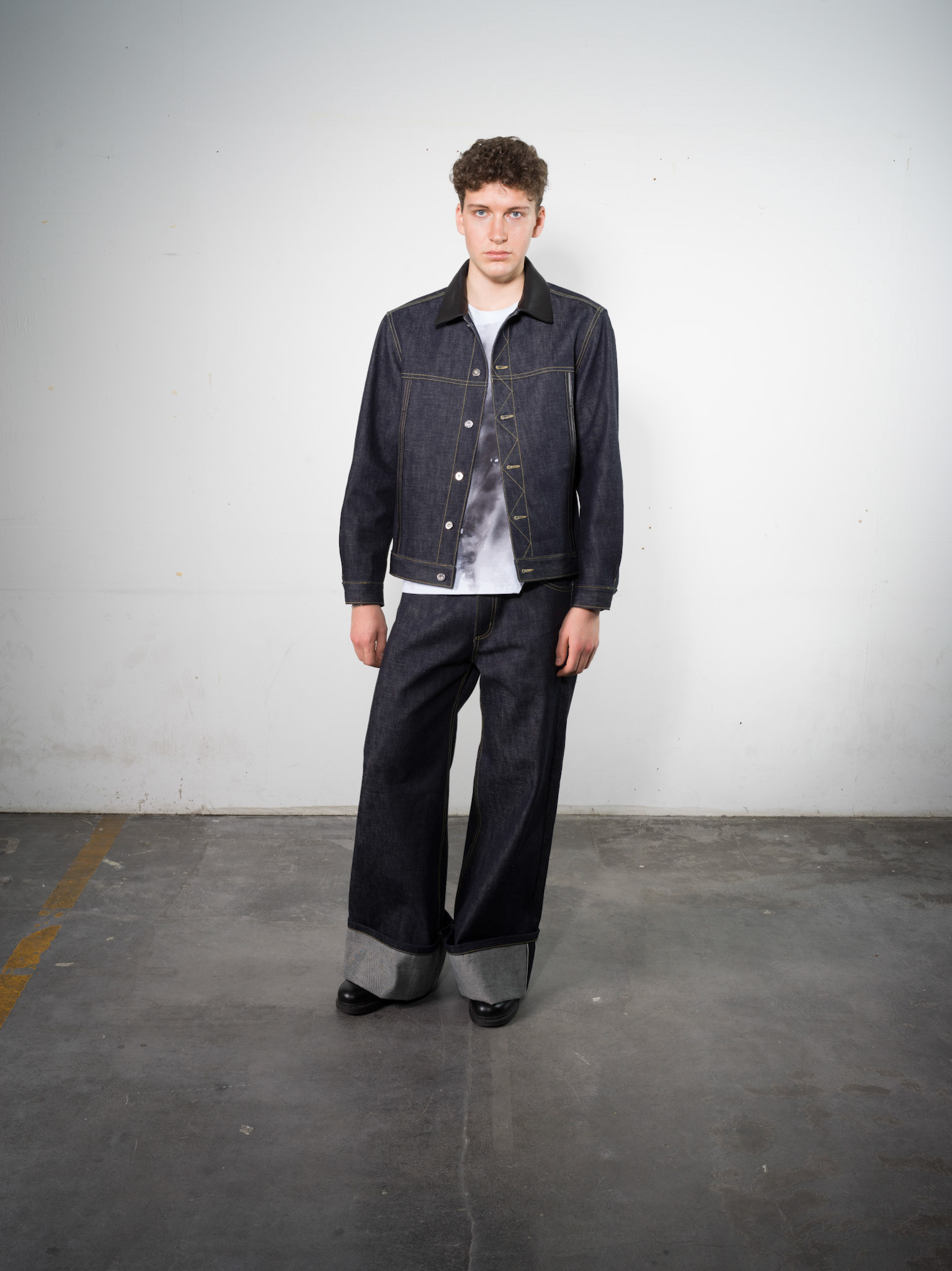 Raw Denim Jacket: Bio Cotton, Indigo - Raw Denim Jeans: Bio Cotton, Indigo - Asymmetrical Buttpon Shirt: Bio Cotton, White
