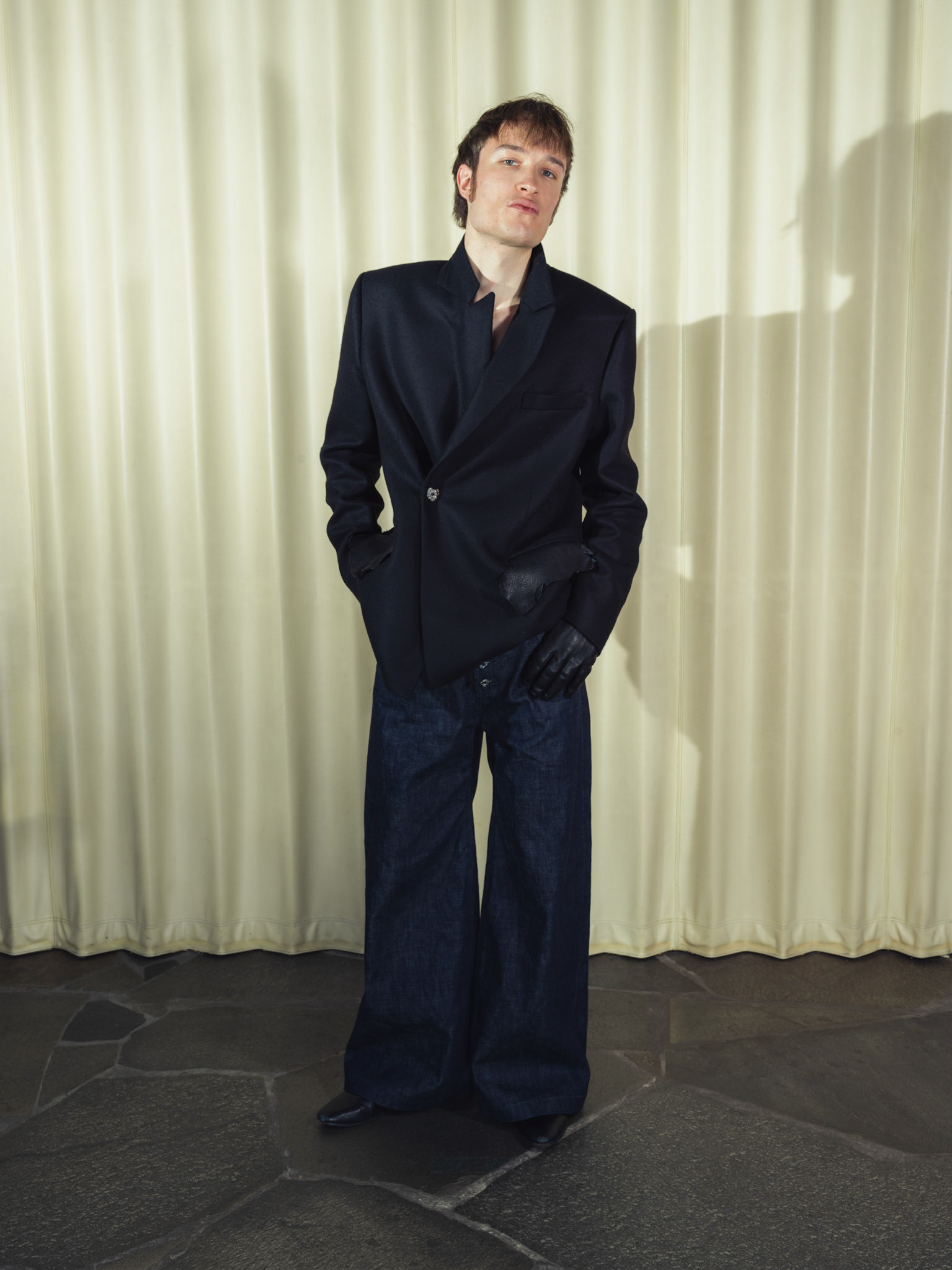 Wool cashmere double breasted blazer, Wide-leg raw selvedge denim jeans, Both with handmade silver buttons and deer leather details