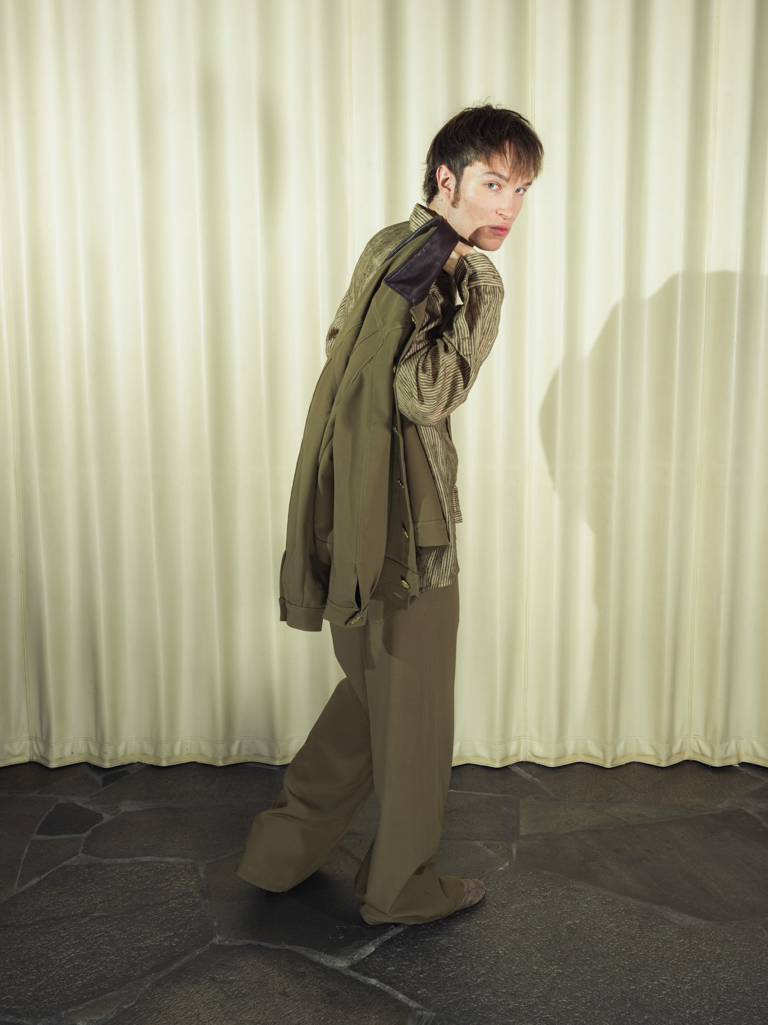 Virgin wool trucker jacket and wide-leg trousers set, Both with handmade brass buttons and deer leather details, Silk striped button-up shirt