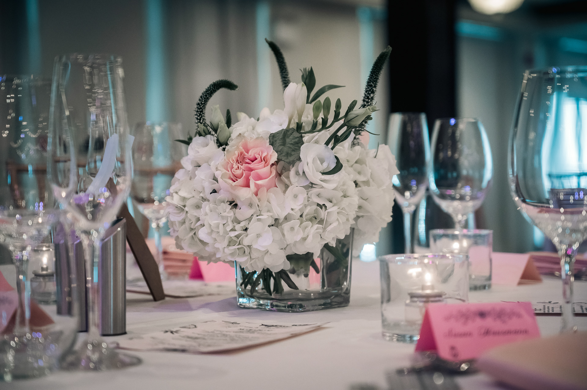 Elegant reception detail: centerpiece with white hydrangeas and blush roses.