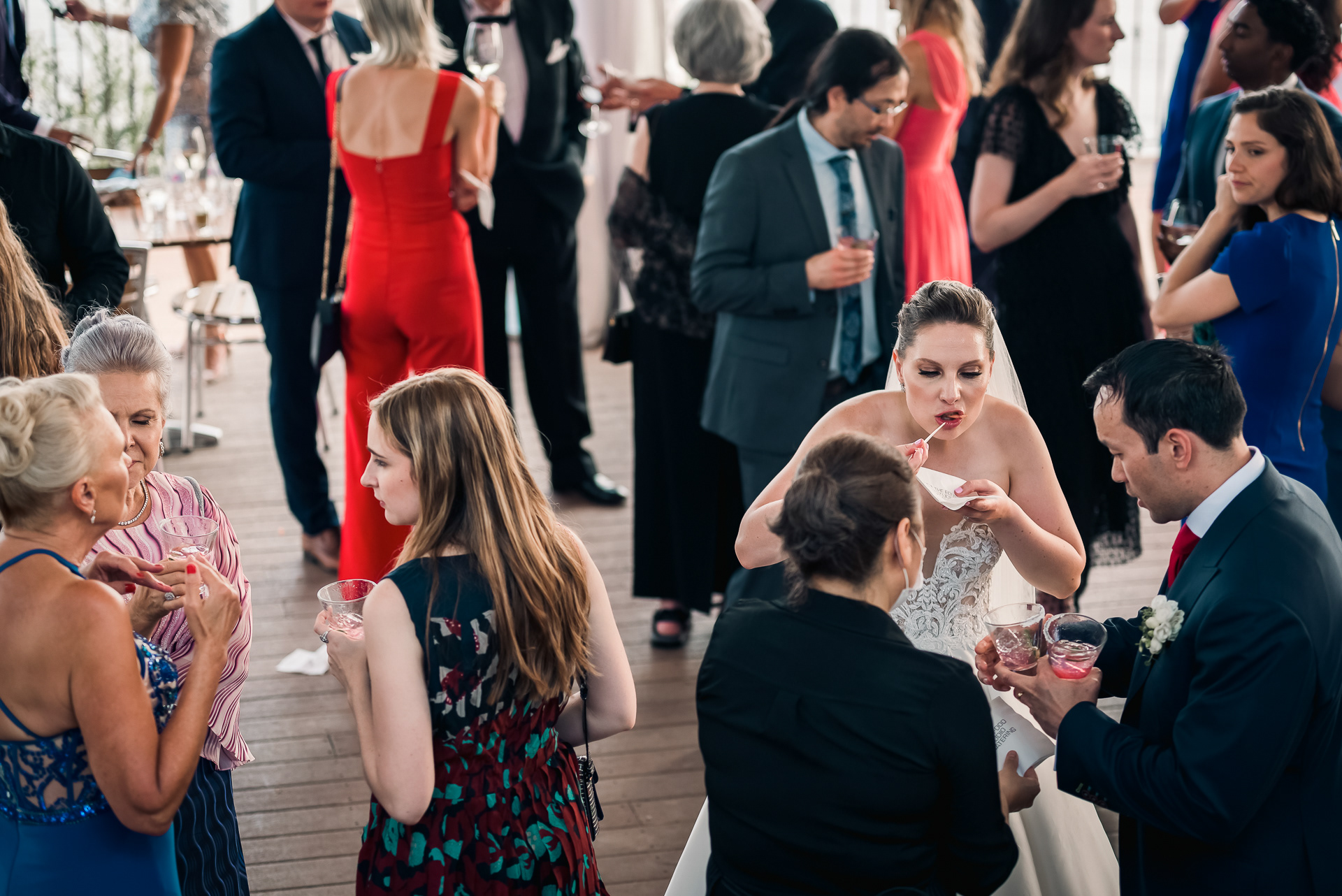 Guests mingling and enjoying conversation during cocktail hour.