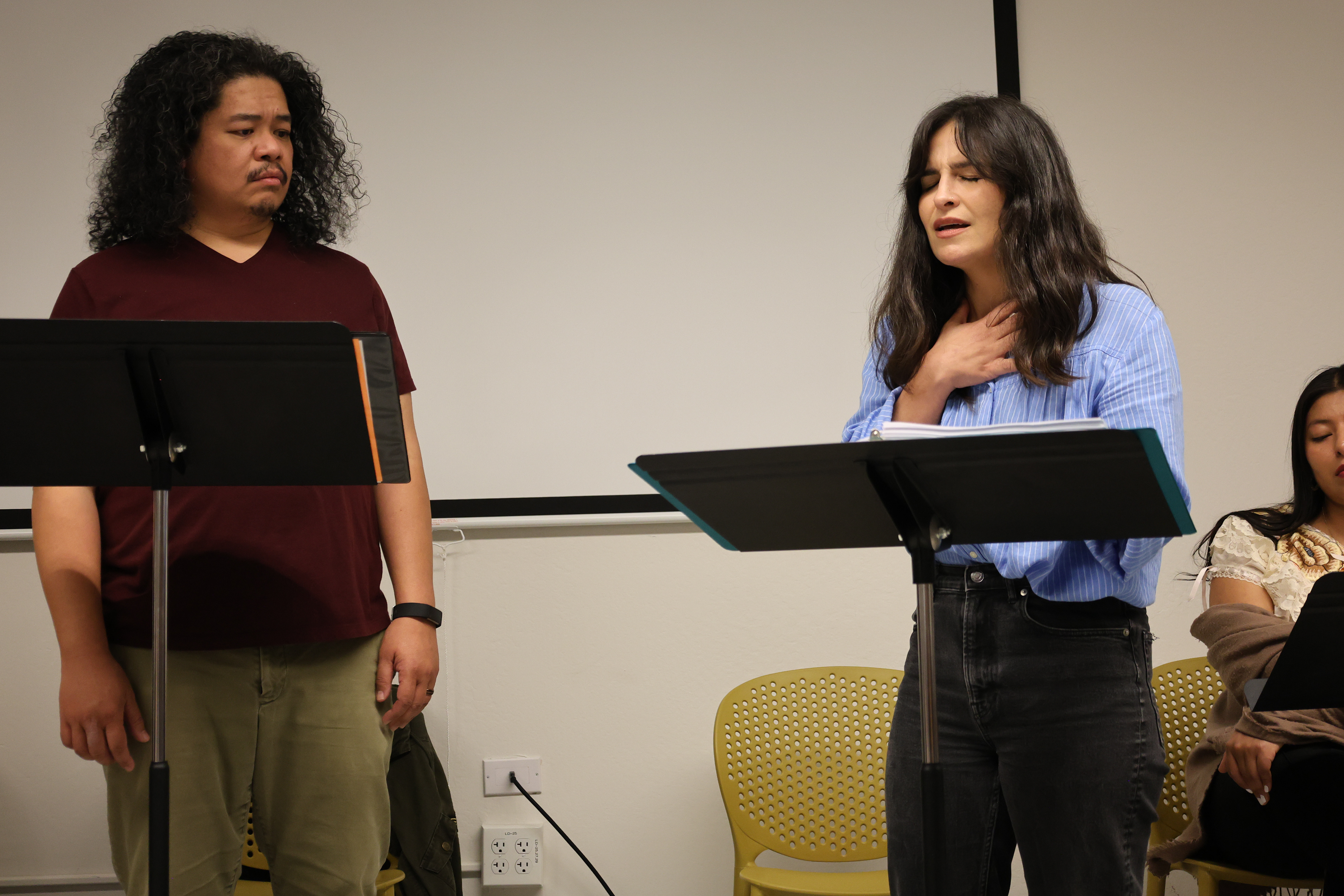 Lea Sanginiti and Tasi Alabastro as "Sister Karina" and "The Father"