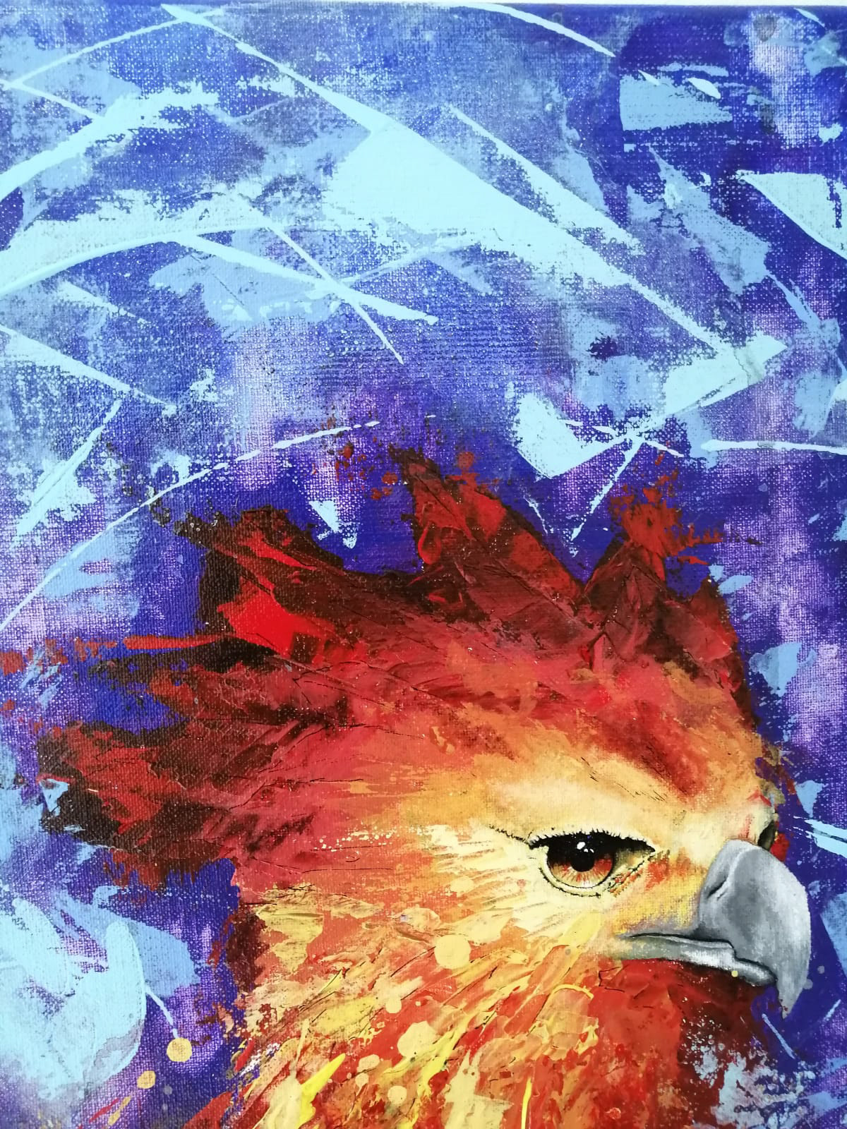 (Top-center Detail) - This close-up focuses on the upper portion of the phoenix's head. Rapid, fragmented brushstrokes create a fiery crest of brilliant yellows and deep reds, conveying a powerful sense of energetic motion. The textured, impressionistic style captures the intensity of the bird's gaze against the atmospheric background of cool purples and light blues.